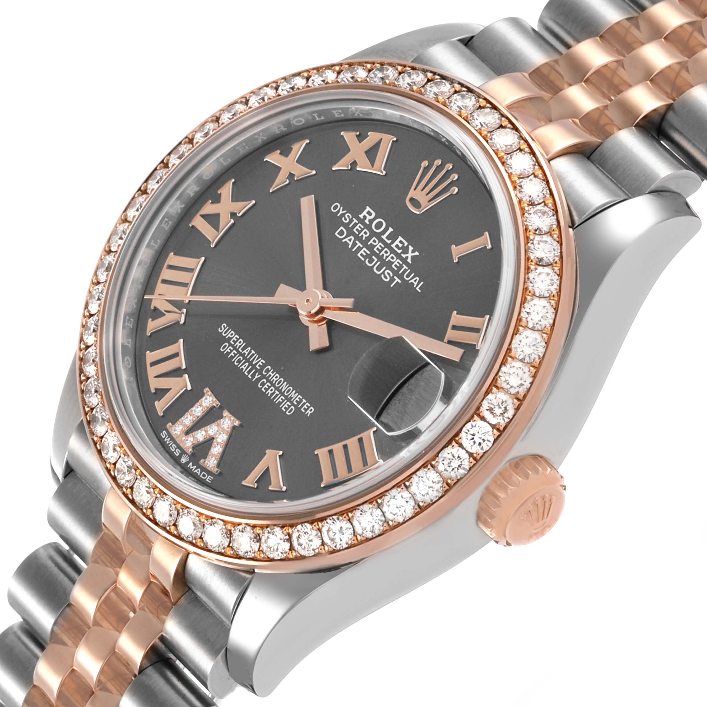 The Rolex Datejust mid-size watch is angled to show the face, bezel, crown, and part of the bracelet.