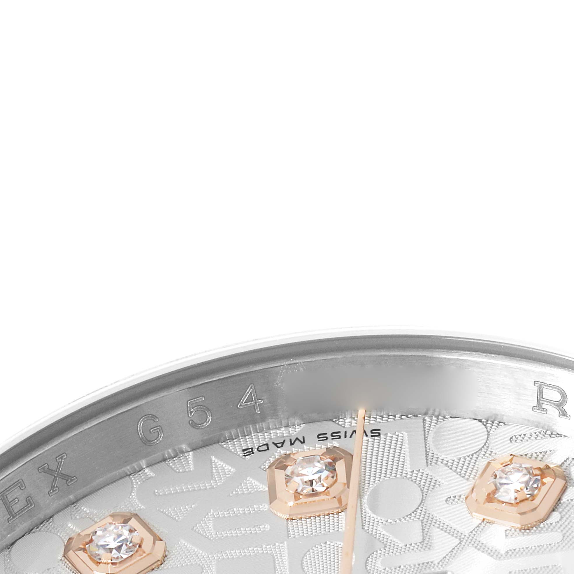 The image shows a close-up of the dial and bezel of a Rolex Datejust 116231 Men's Steel and Gold (two tone) Silver Dial, highlighting diamond markers and part of the engraving.