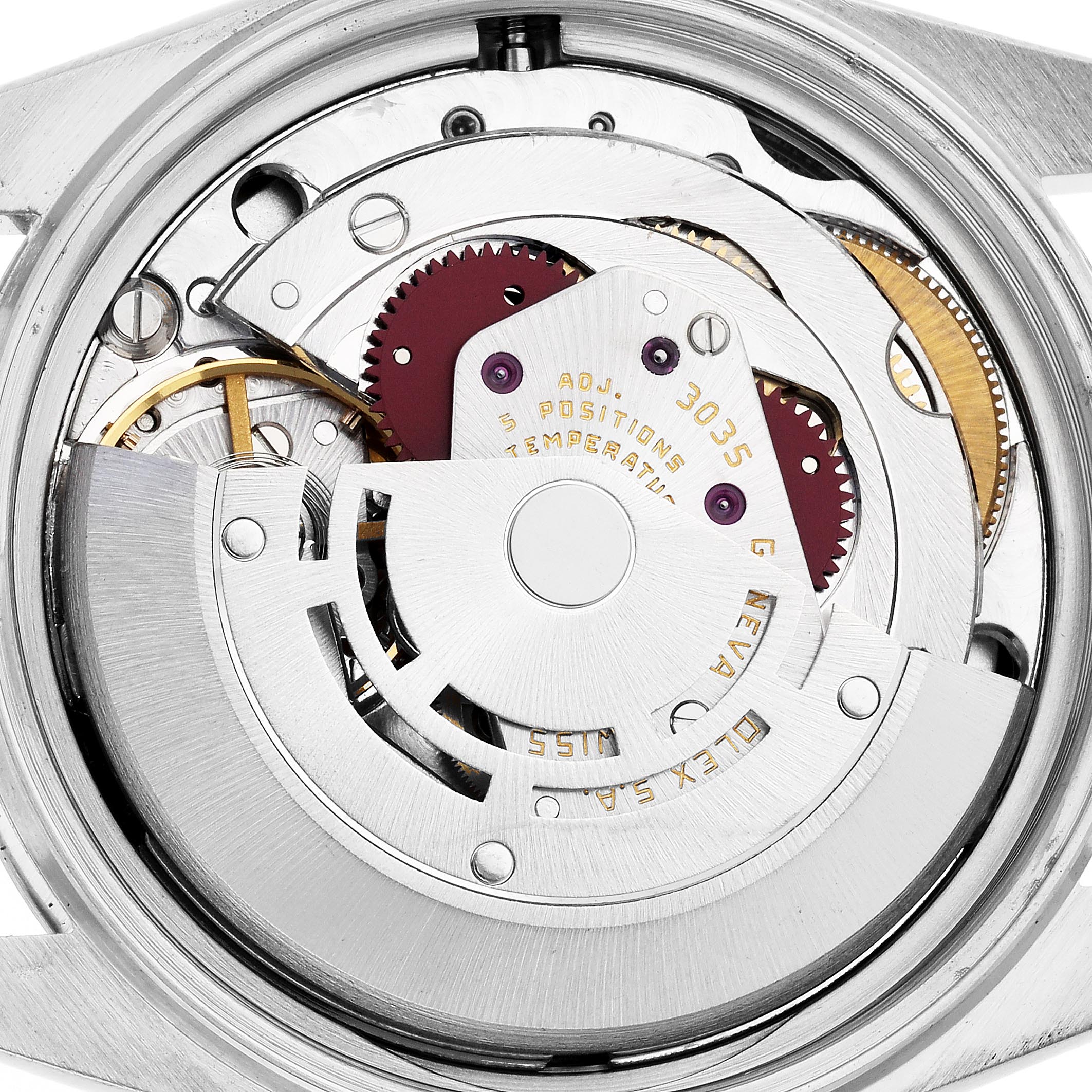 The image shows the movement of a Rolex Datejust 16013 Men's Steel and Gold (two tone) Champagne Dial watch, highlighting gears and the rotor from a top-down angle.