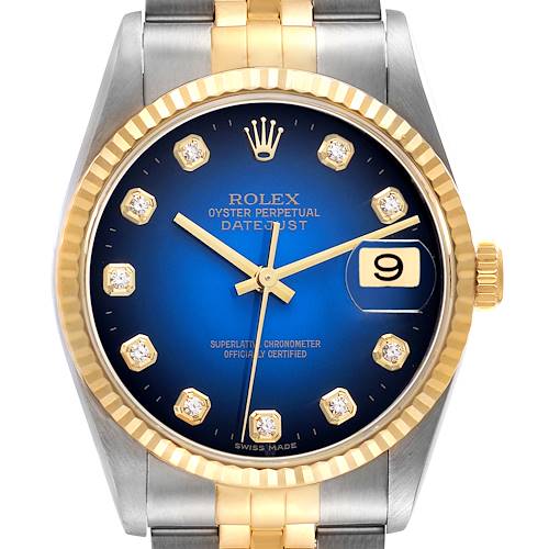 The image shows a front view of a Rolex Datejust watch, highlighting its blue dial, gold bezel, and two-tone bracelet.