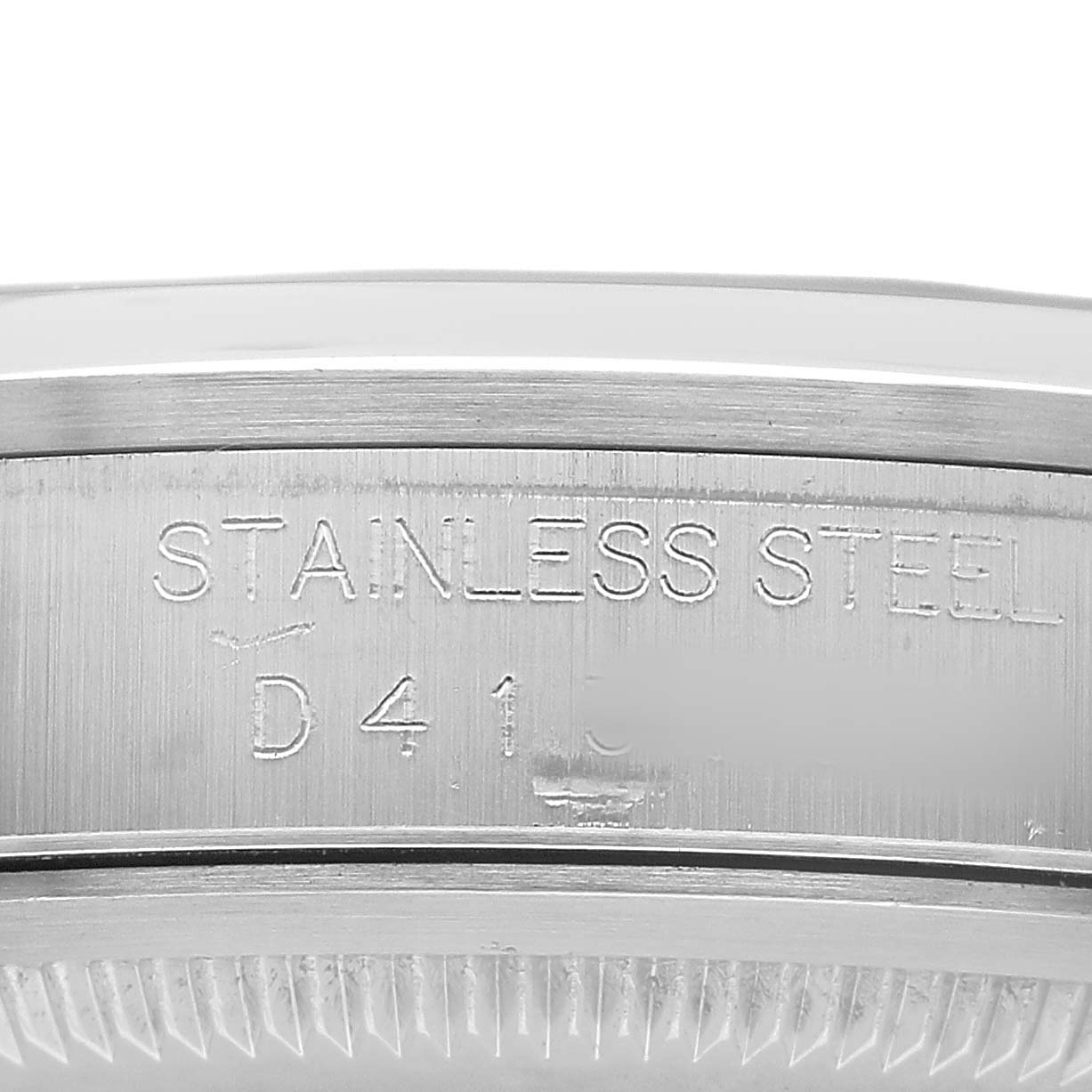 The image shows a close-up of the Rolex Datejust 16200 Mens Stainless Steel Silver Dials side, highlighting the stainless steel bezel and engraved details.