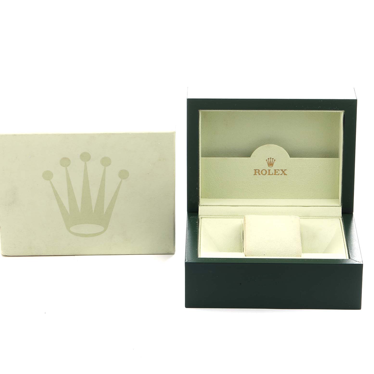 This image shows an open Rolex watch box for the Explorer model, displaying inner padding and packaging.