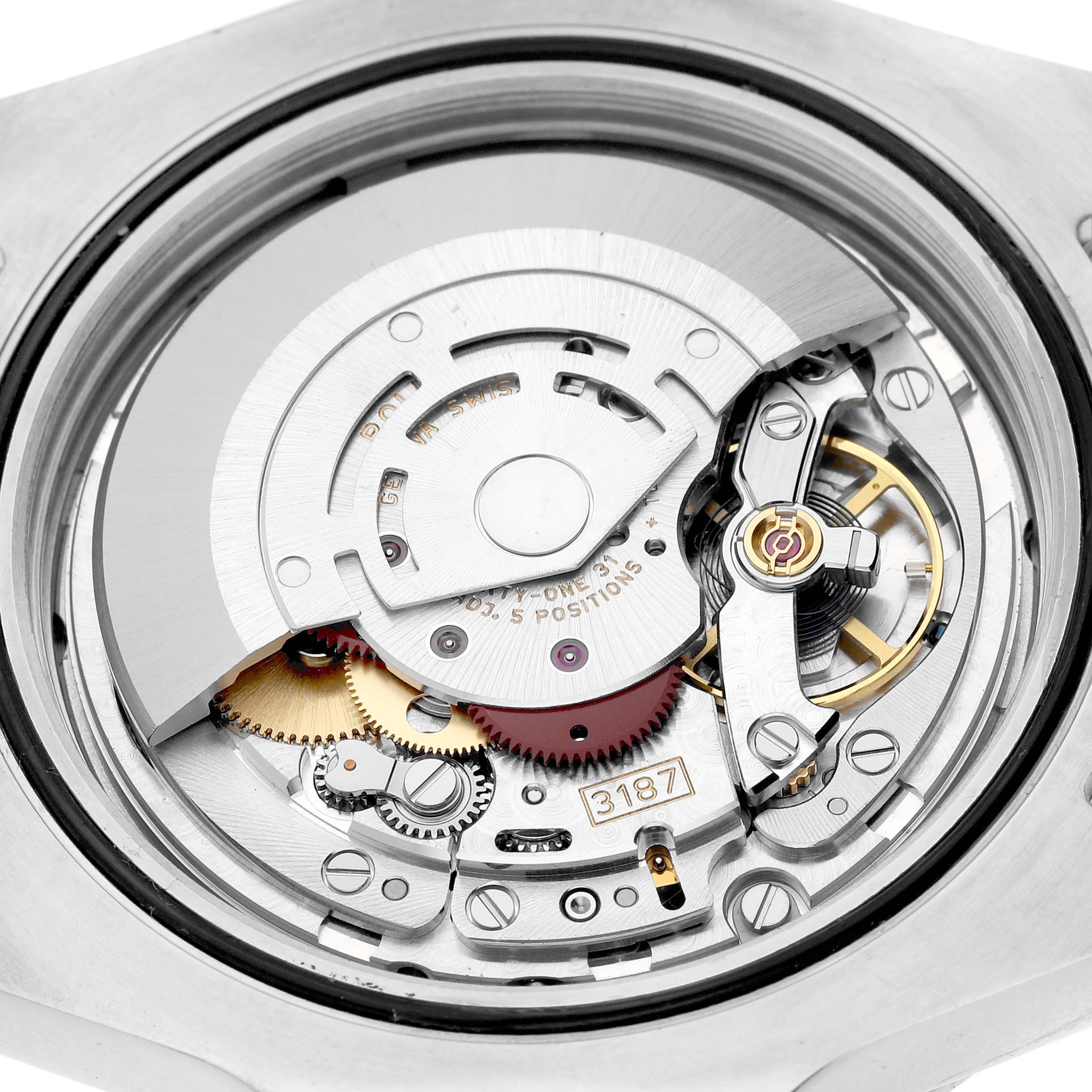 This image shows the movement of a Rolex Explorer 216570 Men's Stainless Steel Black Dial watch in a detailed close-up view.