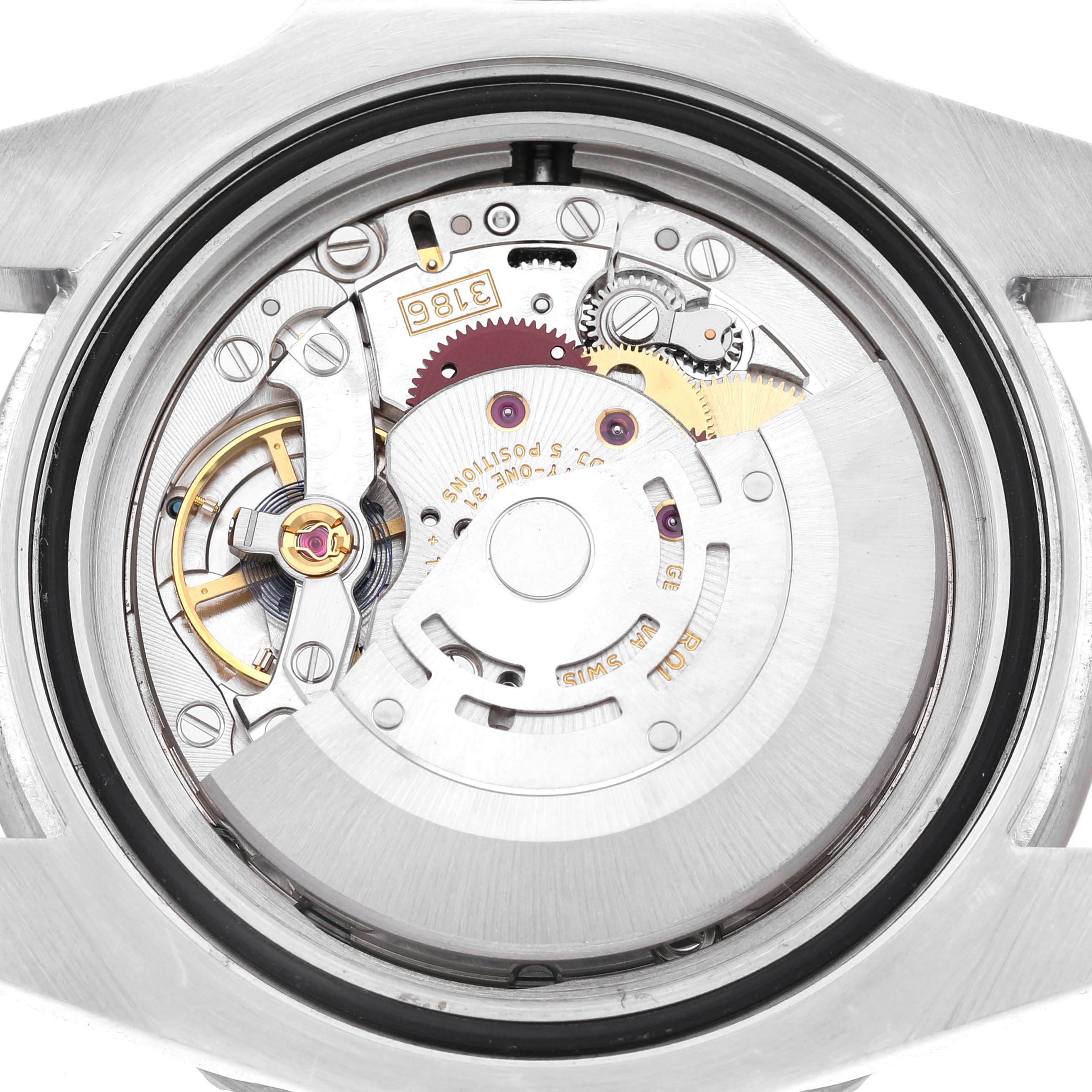 The image shows the movement mechanism of a Rolex GMT-Master 116710 Men's Stainless Steel Black Dial watch from the back.