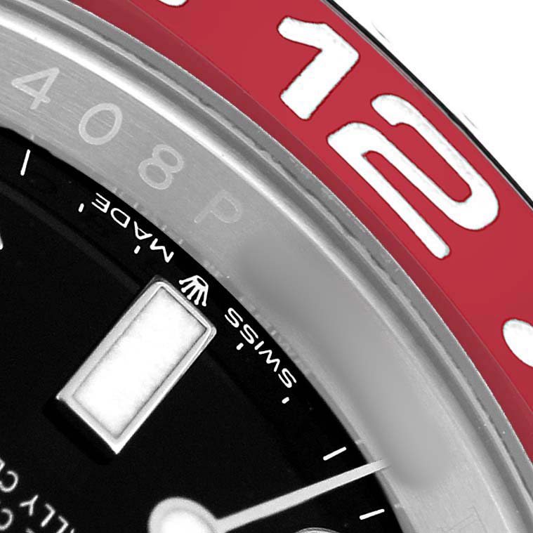 The image shows a close-up of the Rolex GMT-Master 126710BLRO Men's Stainless Steel Black Dial bezel and part of the dial, displaying a red 24-hour marker.