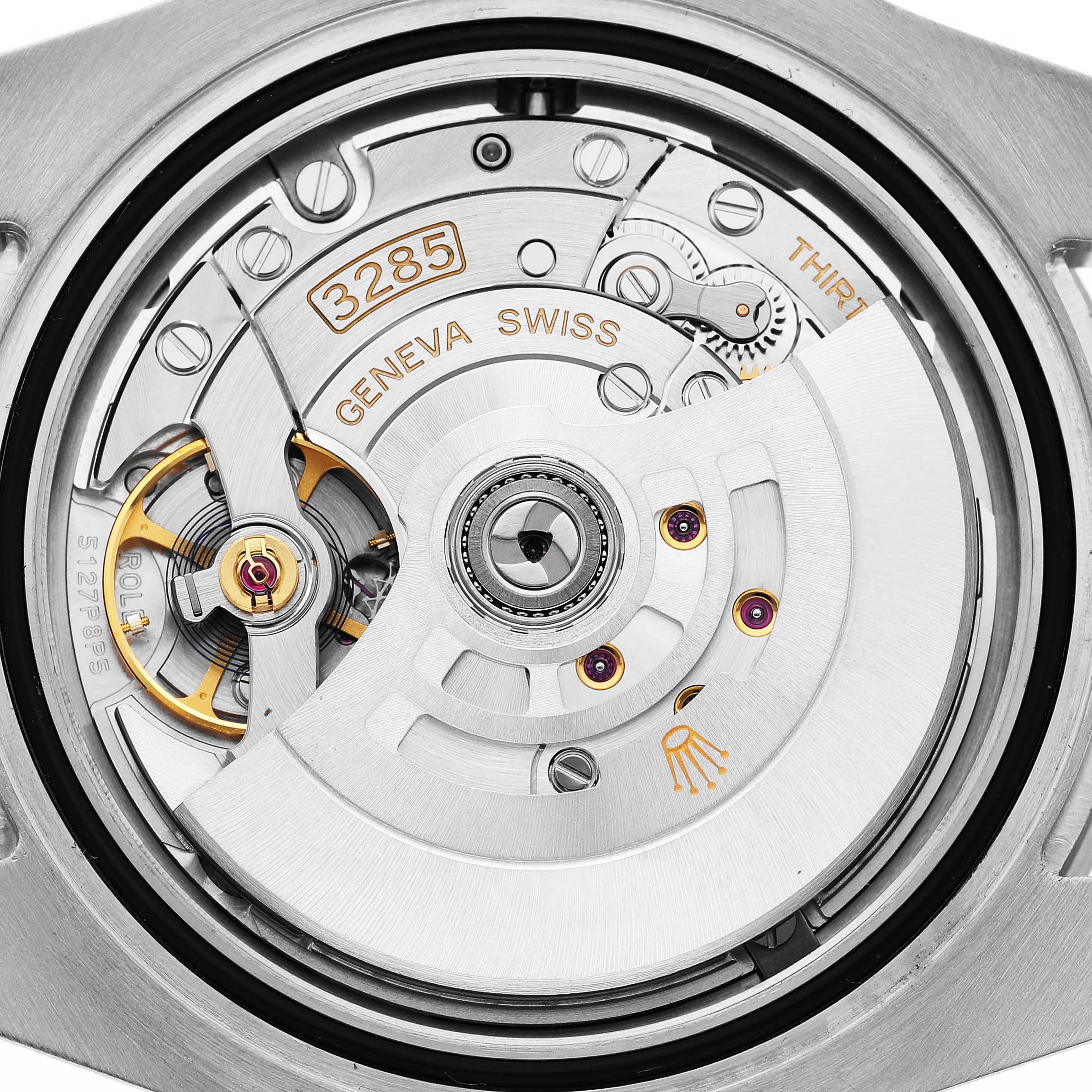 The image shows the intricate movement mechanism of a Rolex GMT-Master 126710BLRO Men's Stainless Steel Black Dial watch, highlighting the caliber 3285 with Geneva Swiss markings.