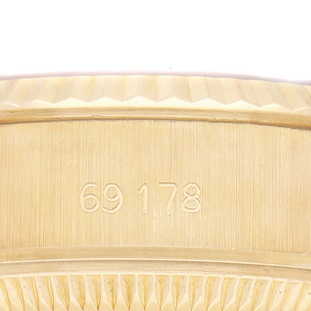 The image shows a close-up of the Rolex President 69178 Women's Yellow Gold Champagne Dial model's side, featuring the engraved model number "69178".
