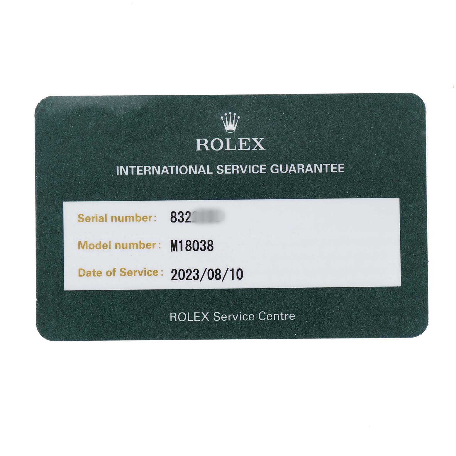The image shows a Rolex service guarantee card for a President model, displaying serial and model numbers.
