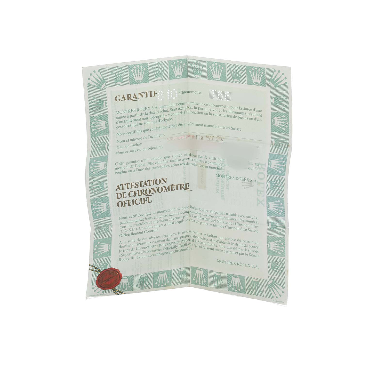 The image shows a warranty certificate for a Rolex Submariner 16610 Men's Stainless Steel Black Dial, featuring the brand's logo and official text.