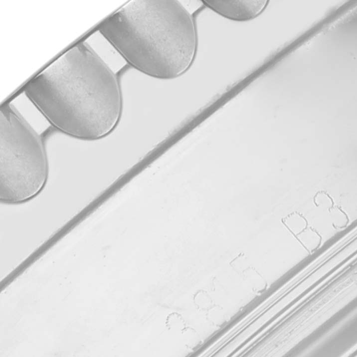 This shows a close-up of the bezel and part of the case back with engravings on the Limited Series model by Breitling.