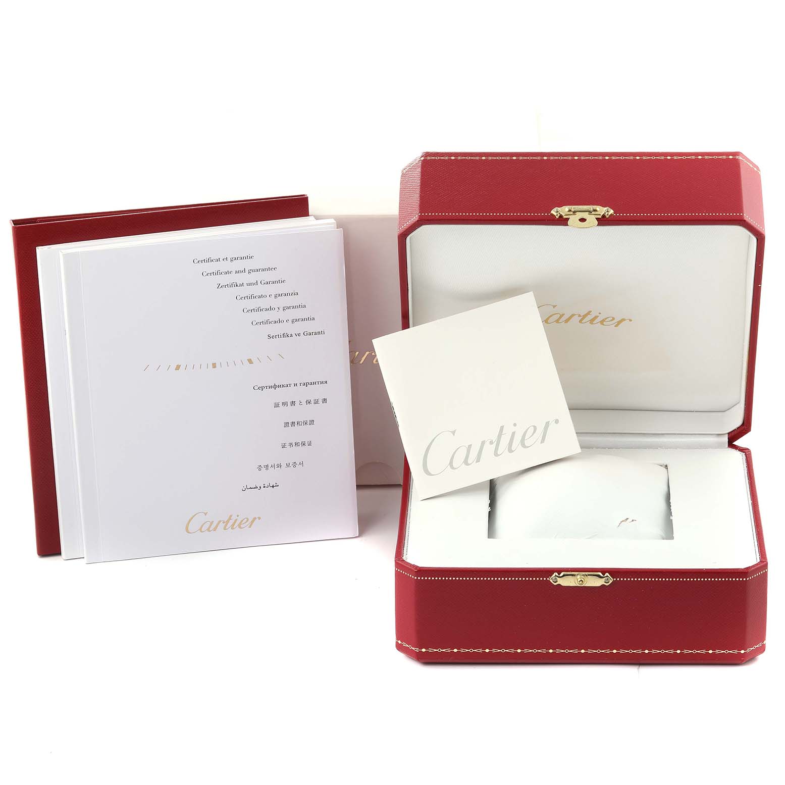 The image shows a red Cartier box, warranty papers, and a booklet for a Calibre de Cartier model.