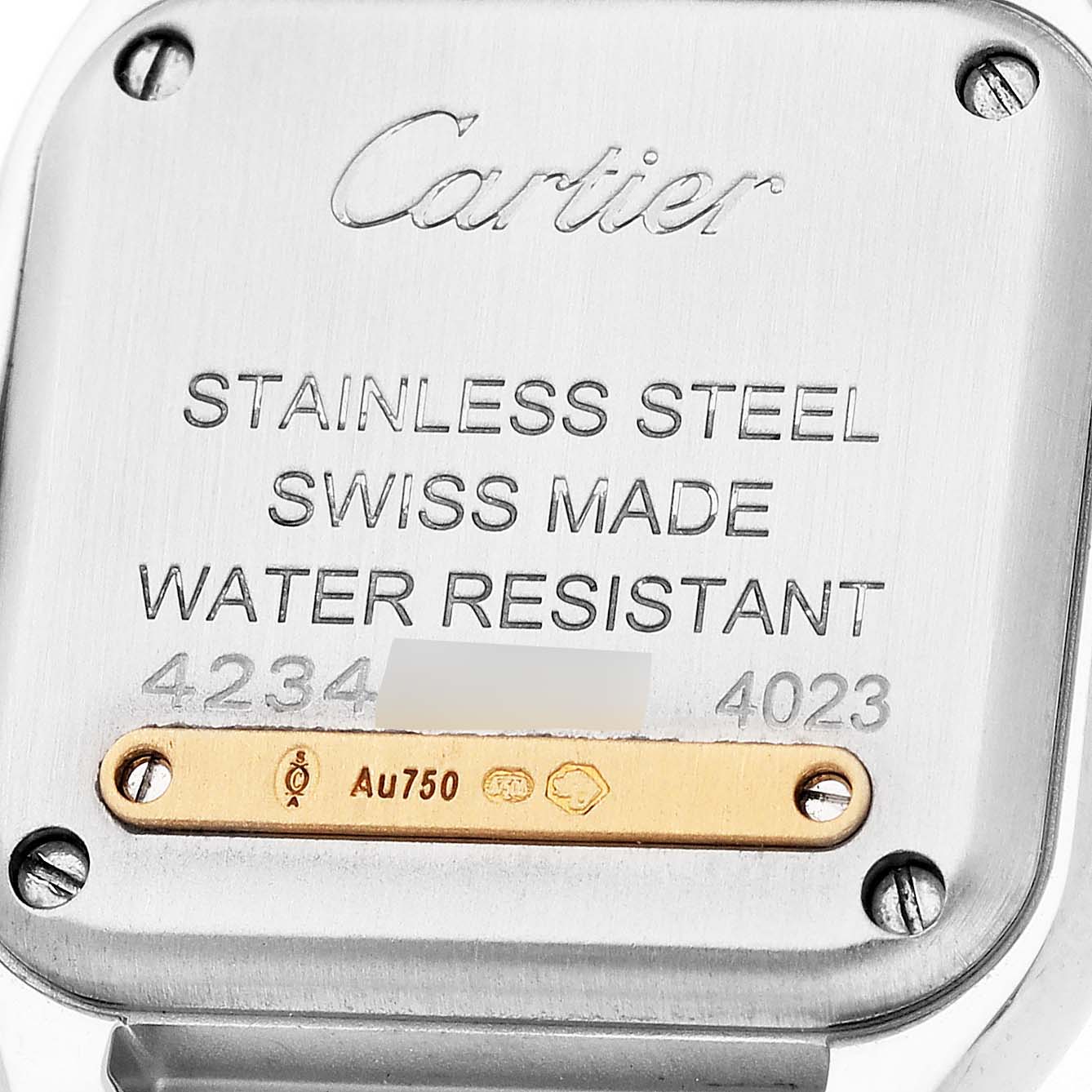 This image shows the back of a Cartier Panthère watch, displaying the engravings and screws.