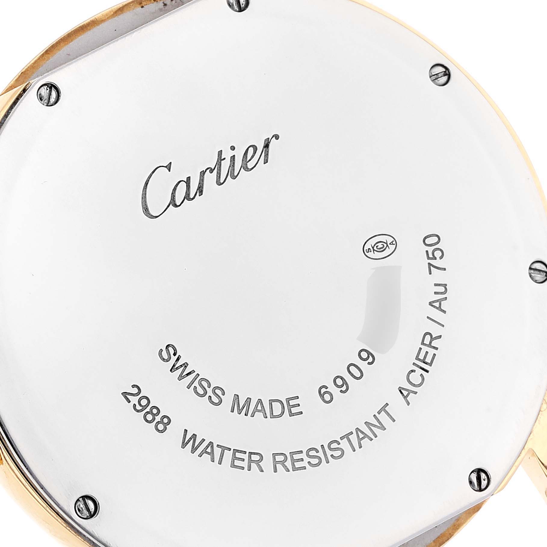 This image shows the back case of a Cartier Ronde W6700455 Men's Yellow Gold Silver Dial W6700455 Men's Yellow Gold Silver Dial watch, highlighting the brand logo and other engraved details.