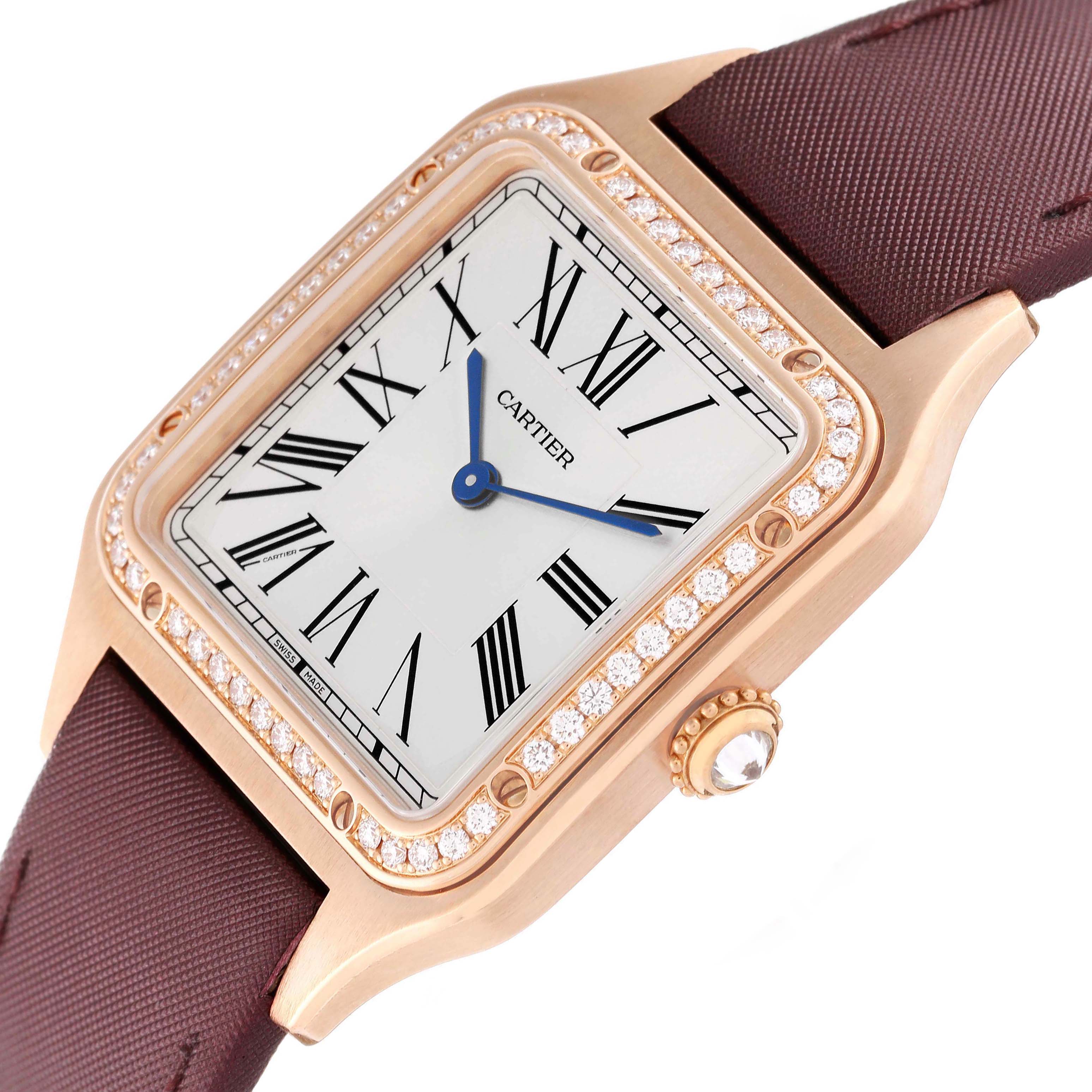 The Cartier Santos Dumont WJSA0018 Men's Rose Gold Silver Dial watch is shown from an angled close-up, highlighting the dial, case, and part of the strap.