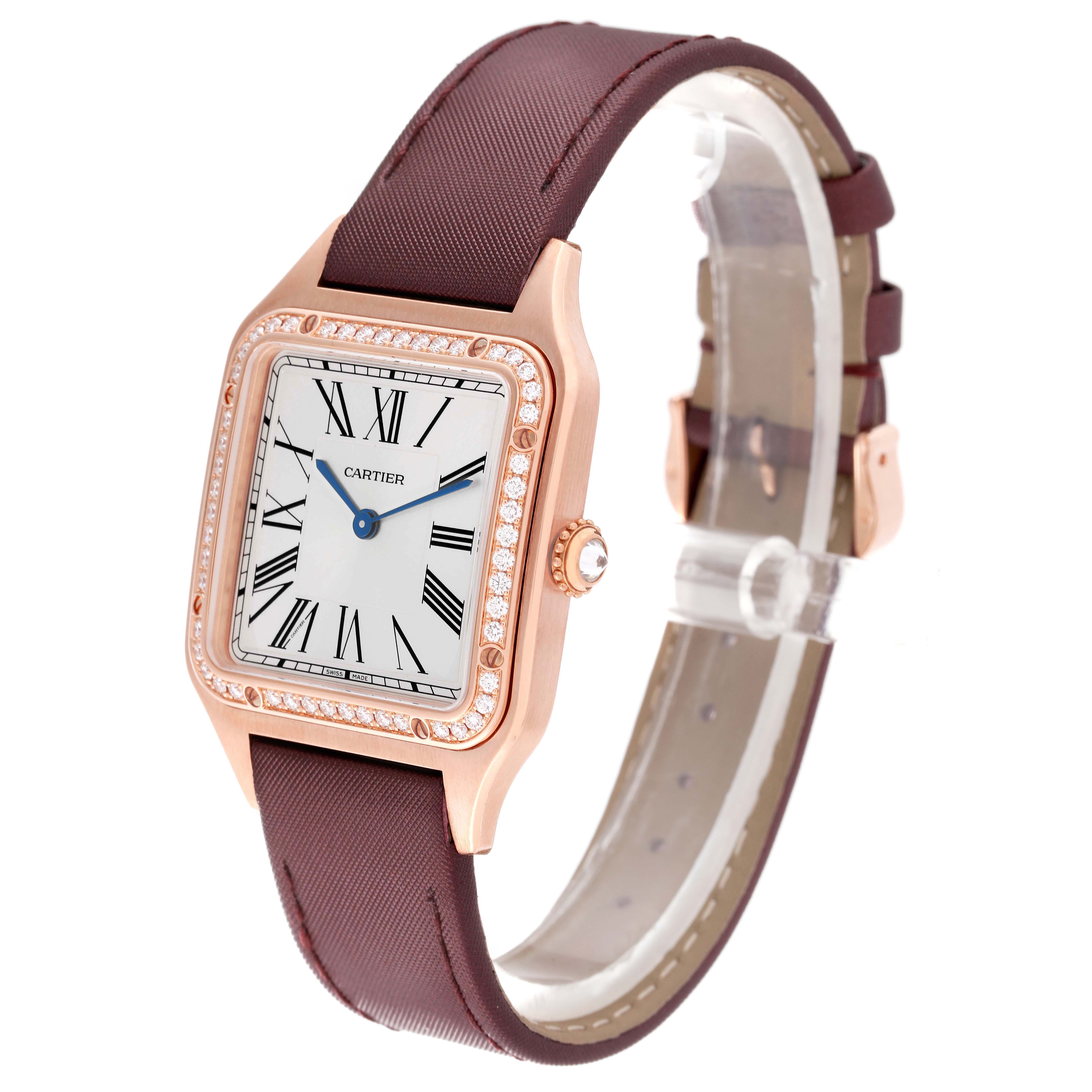 The Santos Dumont by Cartier is shown at an angled front view, highlighting its face, bezel, and strap.