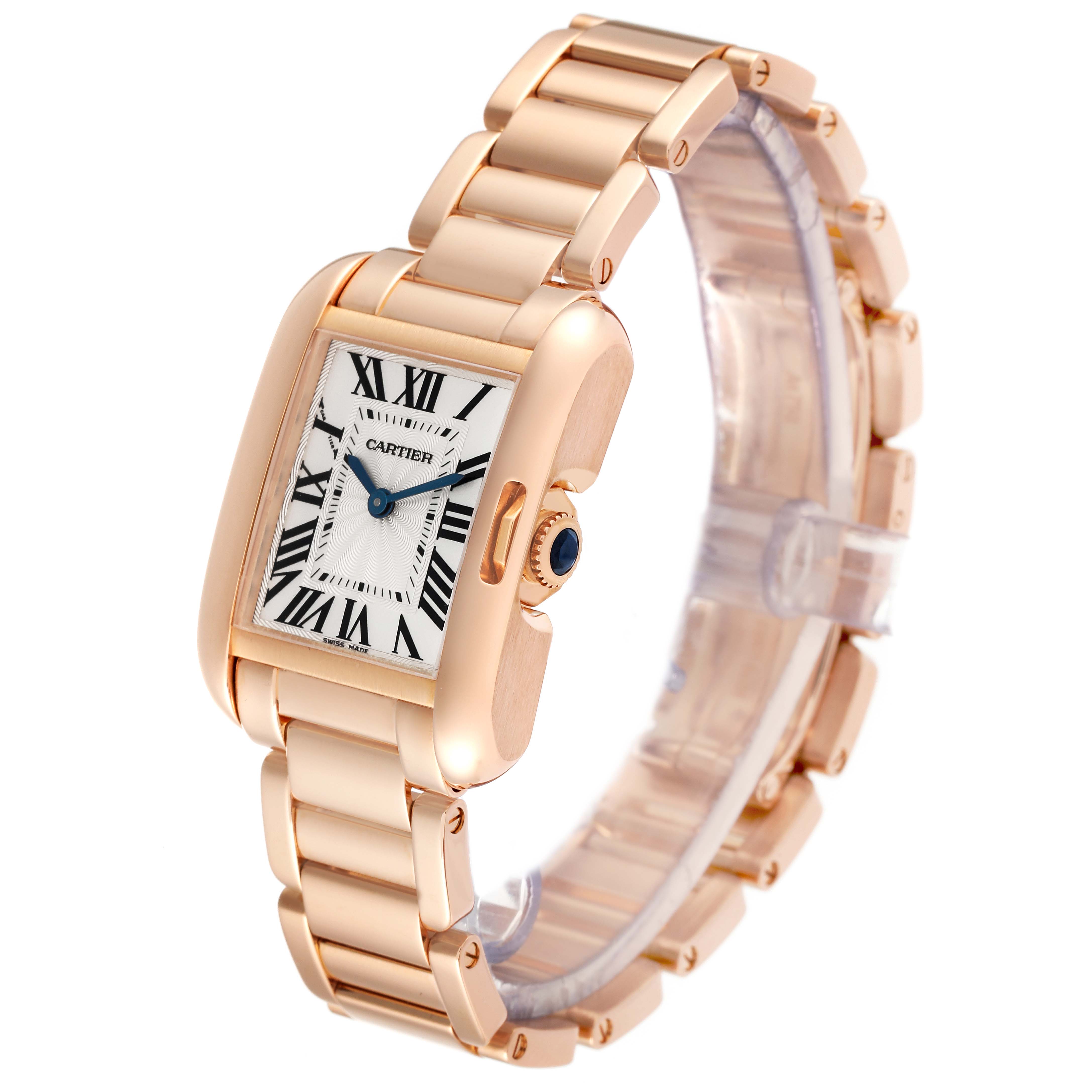 The Cartier Tank Anglaise W5310013 Women
s Rose Gold Silver Dial W5310013 Women
s Rose Gold Silver Dial watch is shown at an angled view, highlighting its rose gold bracelet and rectangular face with Roman numerals.