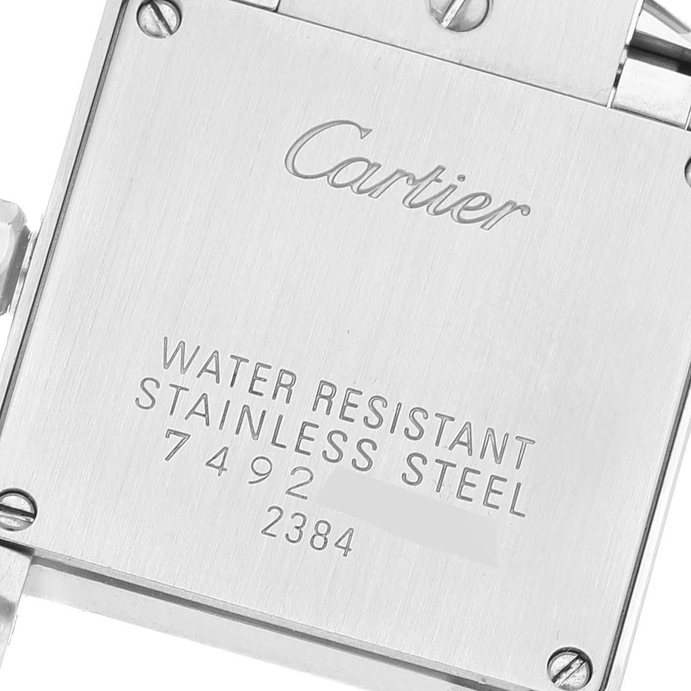 This image shows the back case of a Tank Francaise watch by Cartier, highlighting its stainless steel construction and water resistance.
