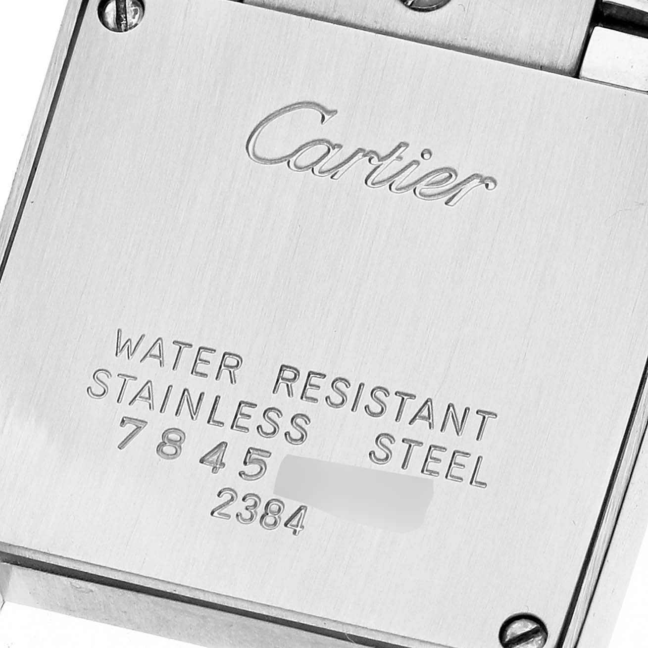 The image shows the case back of a Cartier Tank Francaise W51008Q3 Women's Stainless Steel Silver Dial W51008Q3 Women's Stainless Steel Silver Dial watch, highlighting its branding and water resistance details.