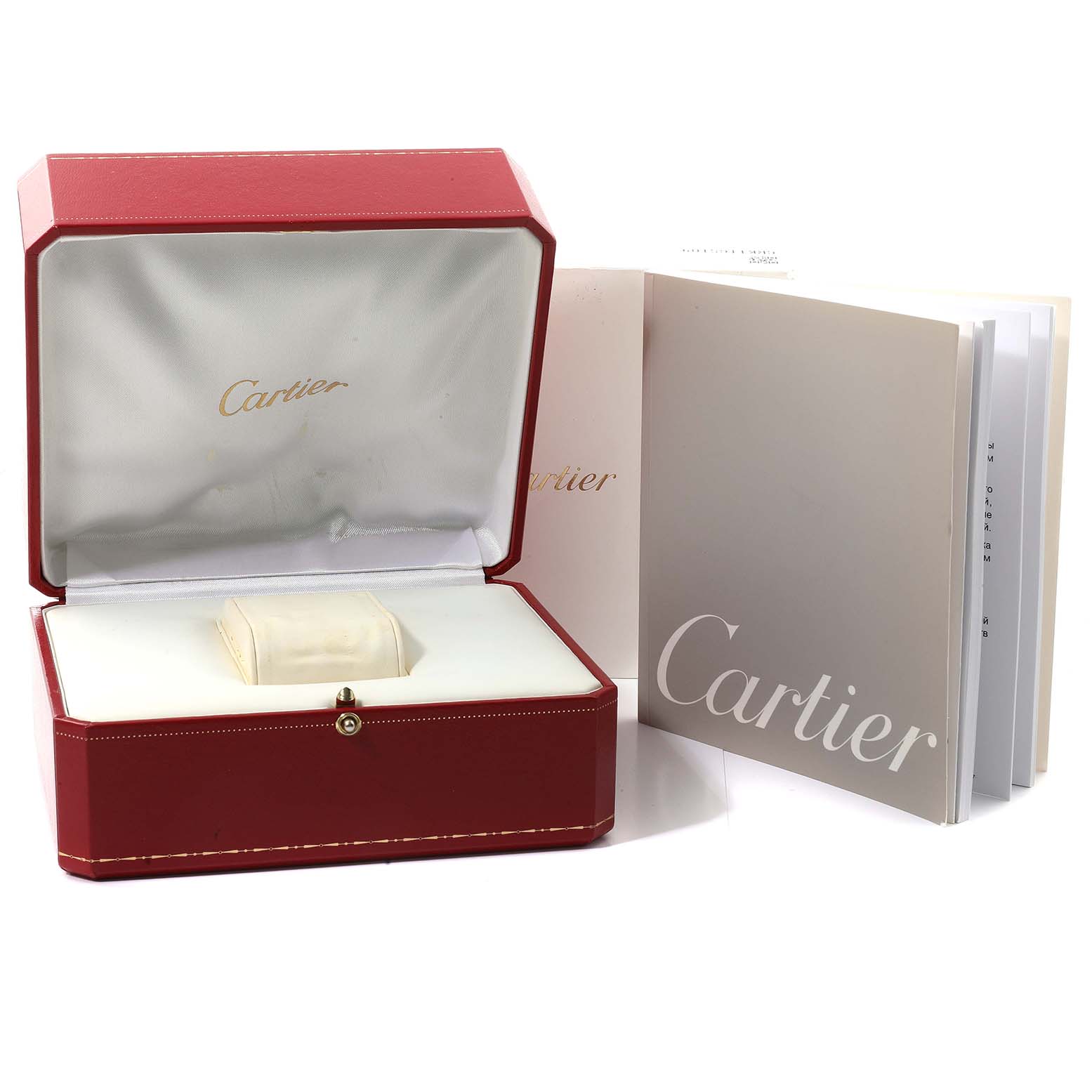 The image shows the box and manuals for the Cartier Tank Française watch, with the box open and the watch pillow inside.