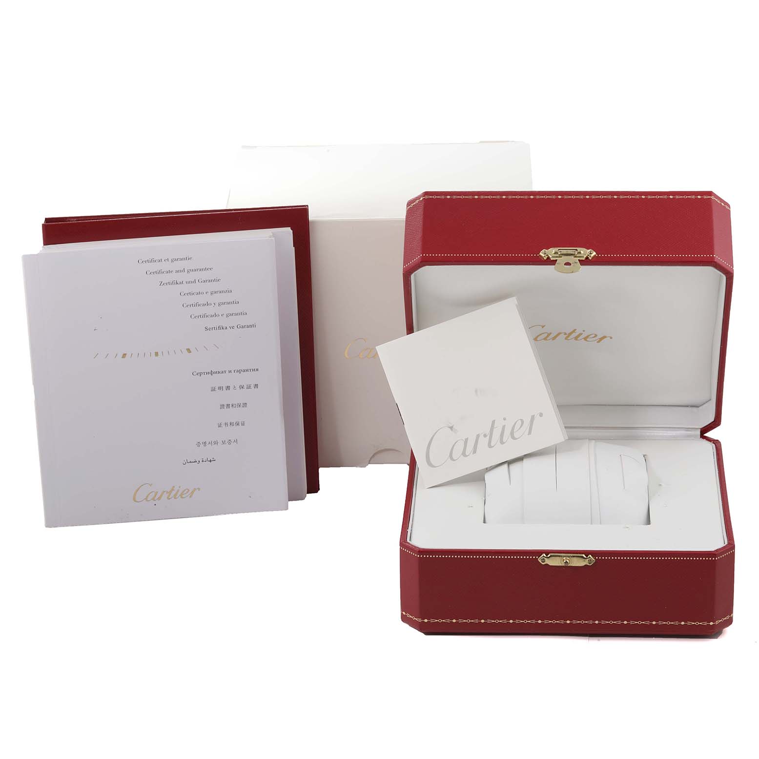 The image shows the packaging and booklets for the Cartier Tank MC W5330003 Men
s Stainless Steel Silver Dial W5330003 Men
s Stainless Steel Silver Dial watch, including the case, warranty card, and manual.