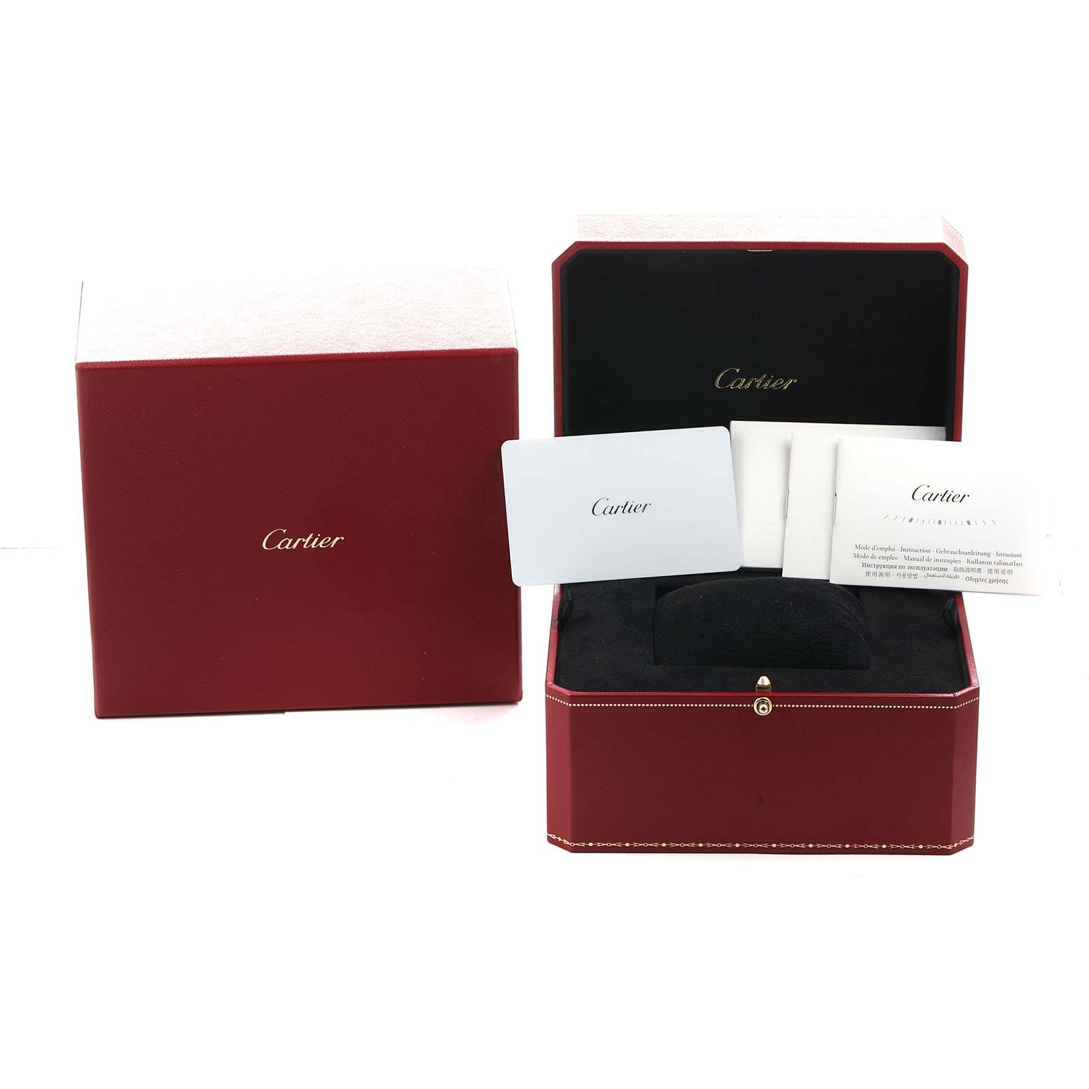 The image shows a Cartier Tank Must WSTA0120 Men's Stainless Steel Silver Dial packaging, with an open red box, a cushion, and accompanying cards.