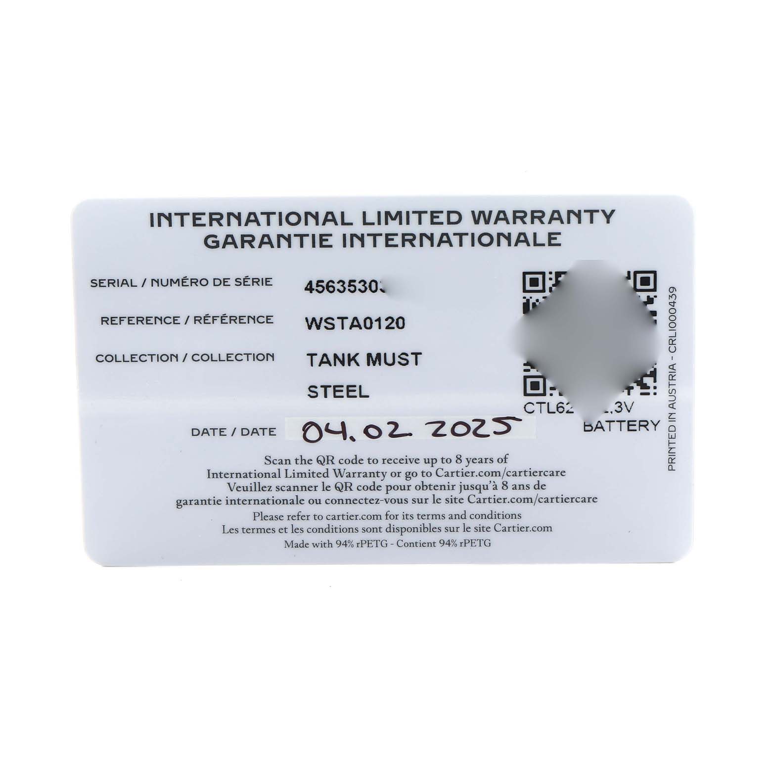 This image shows the International Limited Warranty card for a Cartier Tank Must WSTA0120 Men's Stainless Steel Silver Dial model watch.