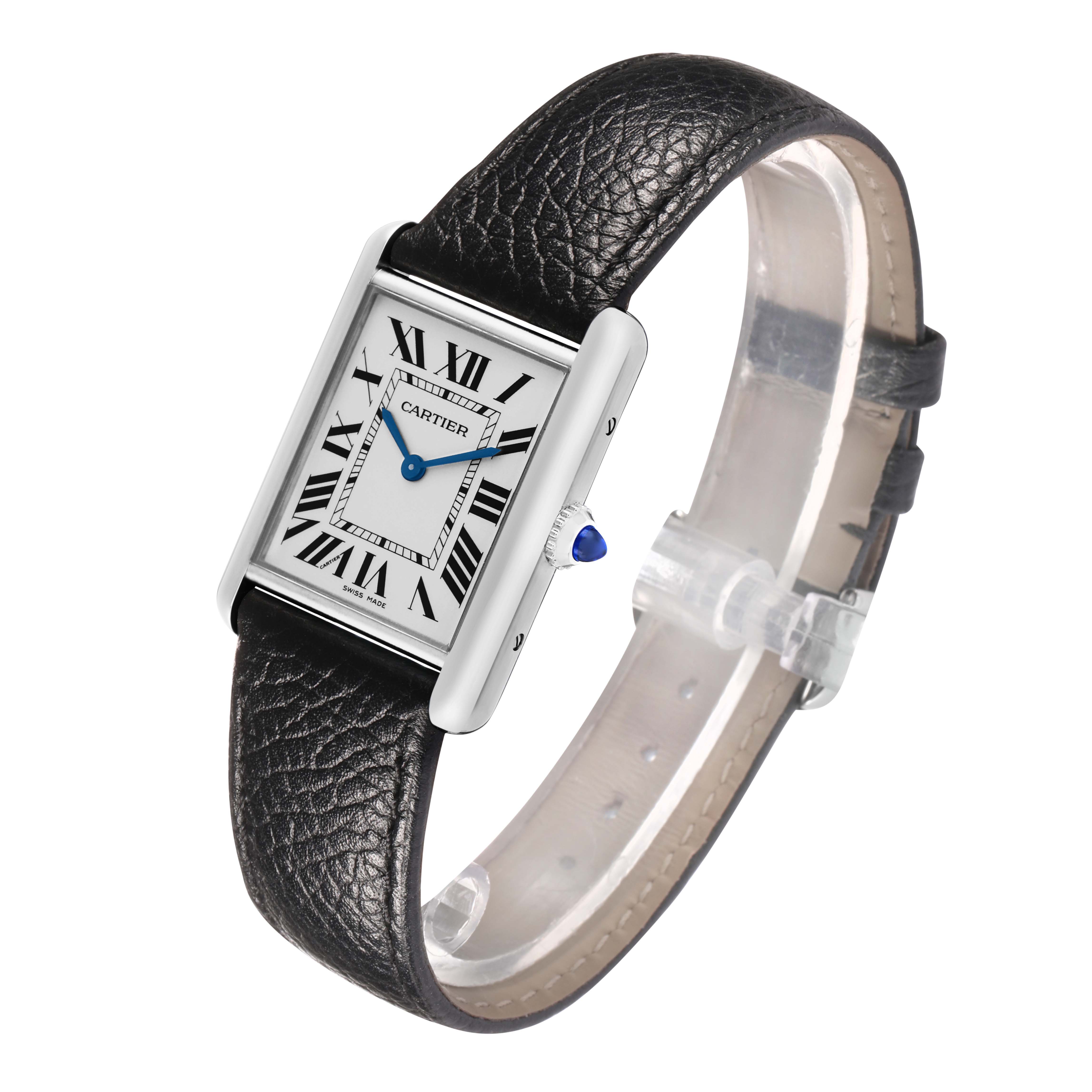 The Cartier Tank Must WSTA0120 Men's Stainless Steel Silver Dial watch is shown at a slight angle, highlighting its face, Roman numerals, strap, and crown with blue cabochon.