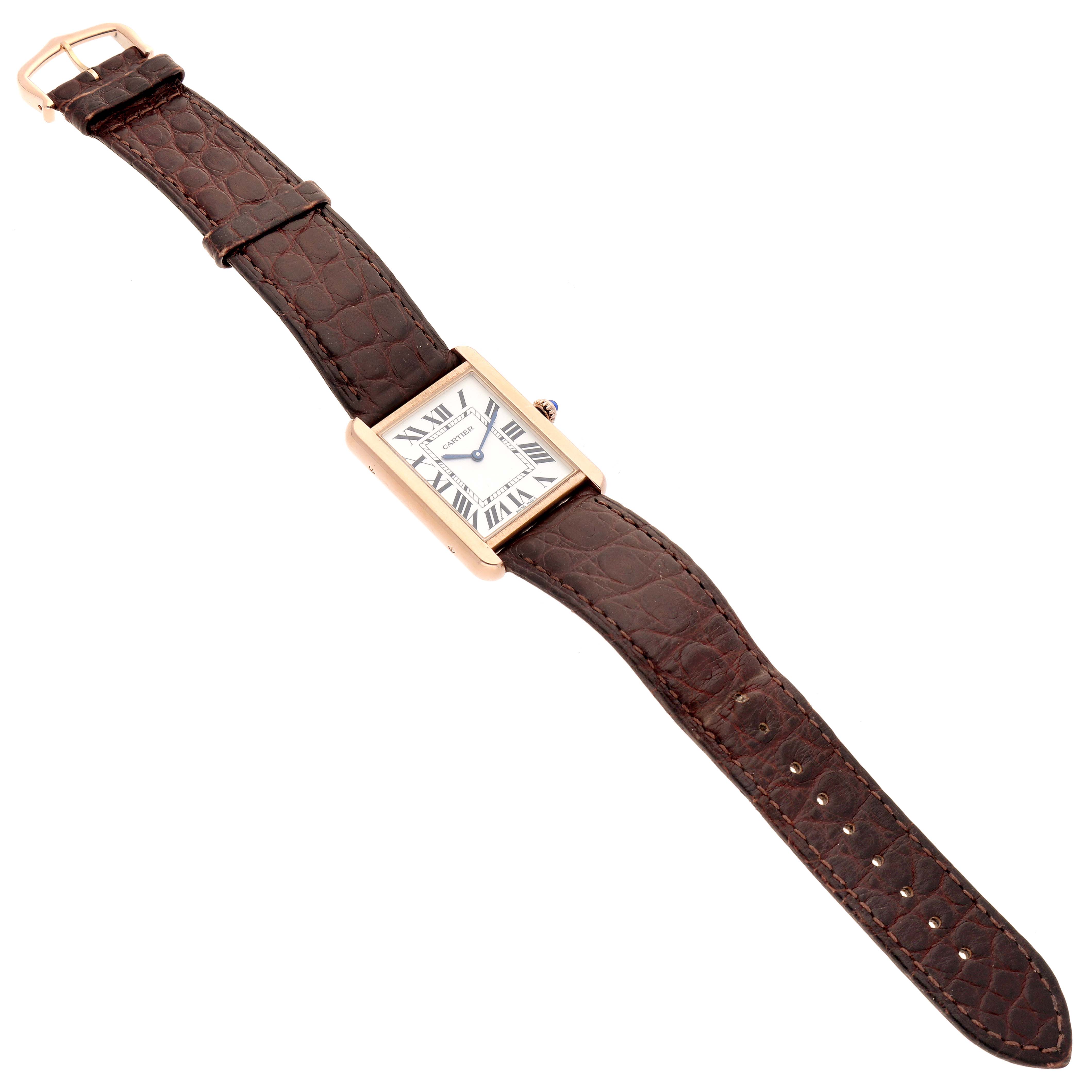 The image shows the full front view of a Cartier Tank Solo W5200025 Men's Steel and Gold (two tone) Silver Dial W5200025 Men's Steel and Gold (two tone) Silver Dial watch with a brown leather strap and a square gold case.