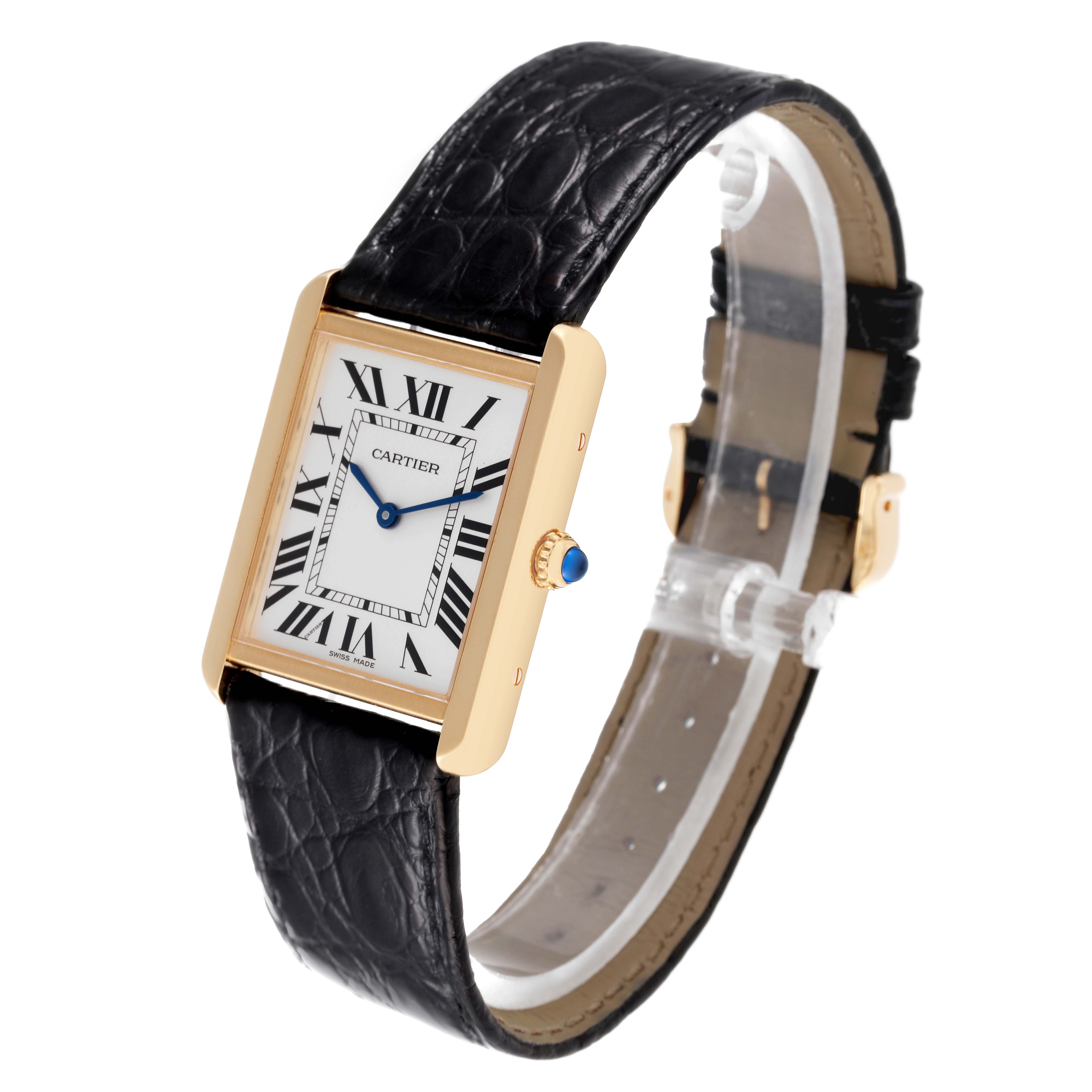 The image shows a Cartier Tank Solo W5200004 Men's Yellow Gold Silver Dial W5200004 Men's Yellow Gold Silver Dial watch with a gold rectangular case, black leather strap, and Roman numeral dial at a side angle.