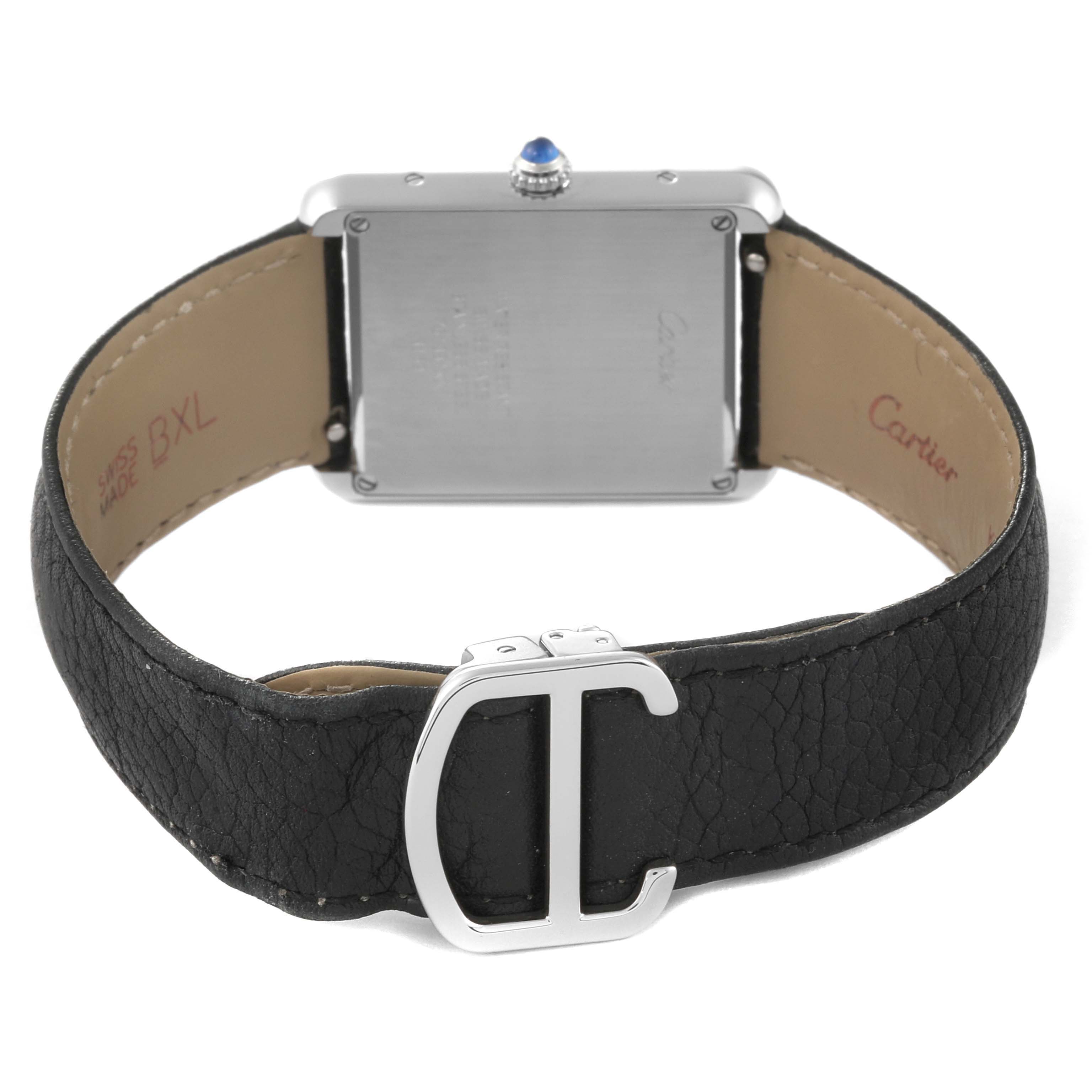 The image shows the back view of the Cartier Tank Solo WSTA0028 Men's Stainless Steel Silver Dial WSTA0028 Men's Stainless Steel Silver Dial watch, highlighting the case back, leather strap, and buckle.