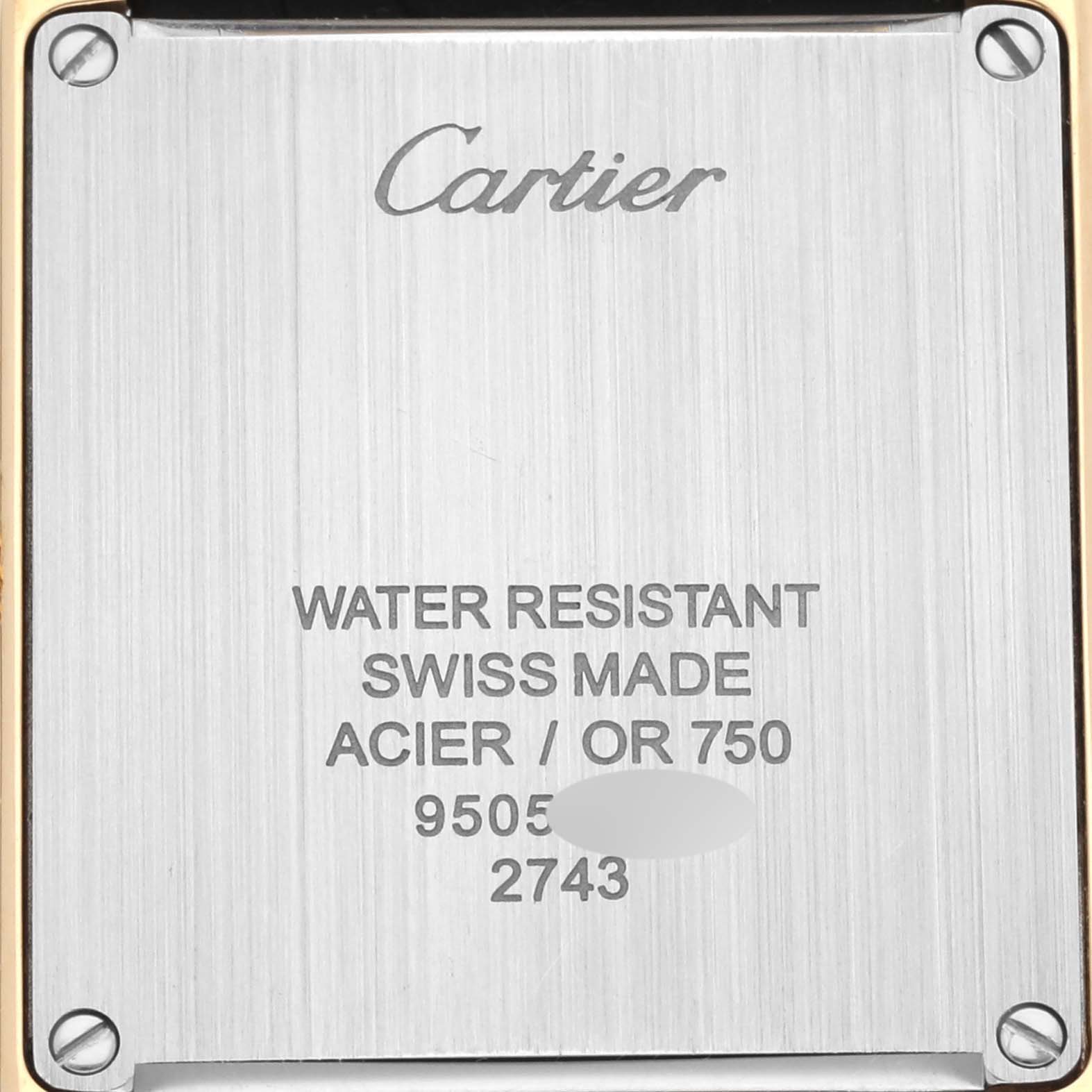 This image shows the back casing of a Cartier Tank Solo W1018755 Women's Steel and Gold (two tone) Silver Dial W1018755 Women's Steel and Gold (two tone) Silver Dial watch, highlighting the brand logo and specifications.