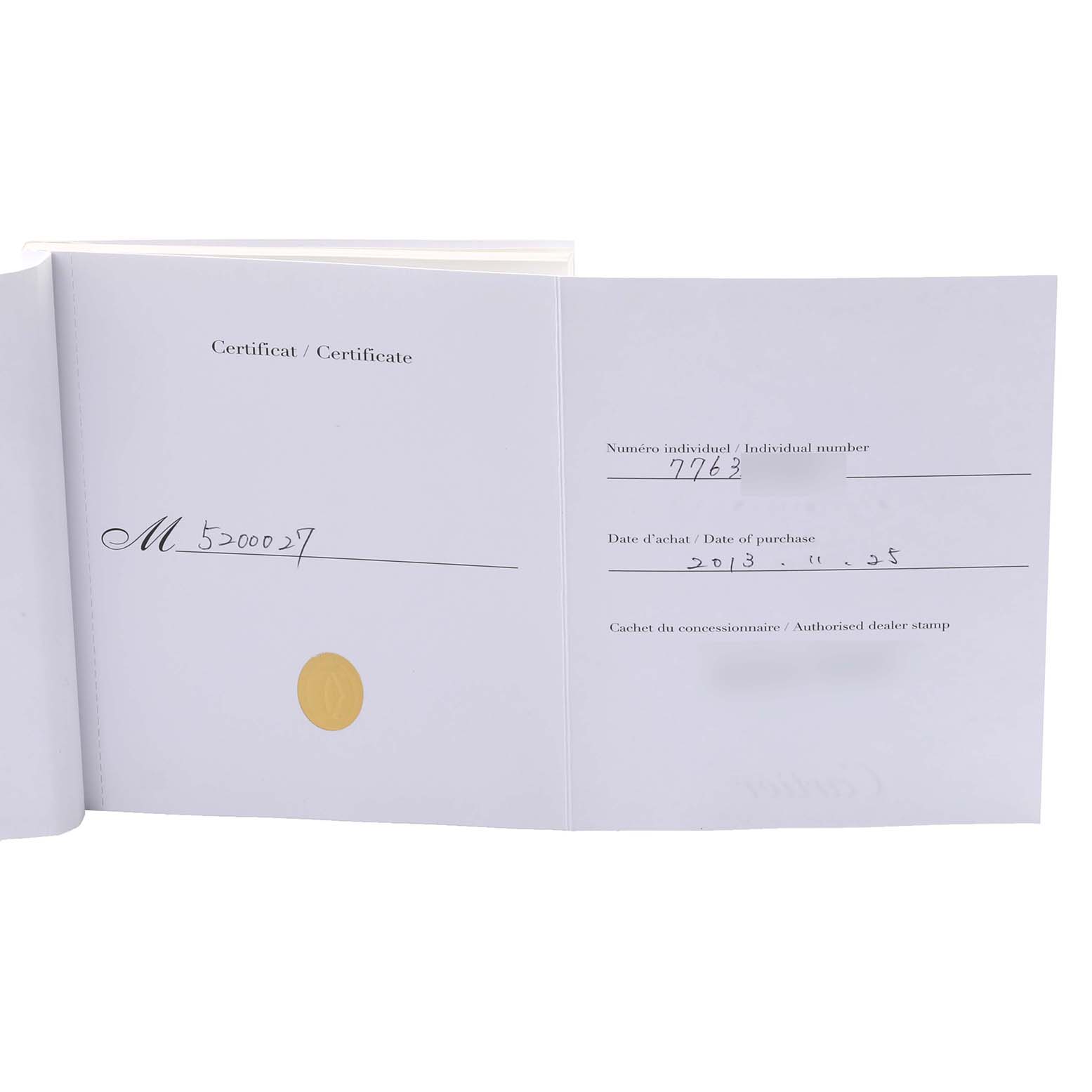 The image shows the certification booklet for a Cartier Tank Solo W5200027 Men's Stainless Steel Silver Dial W5200027 Men's Stainless Steel Silver Dial watch, displaying the purchase date and individual number.