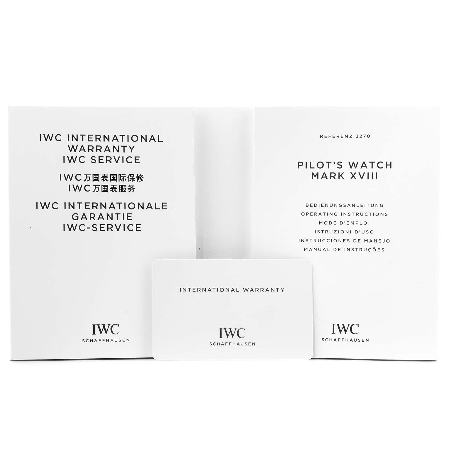 The image shows the warranty and instruction manuals for the IWC Pilot 29275 Men's Stainless Steel Blue Dial 29275 Men's Stainless Steel Blue Dial's Watch Mark XVIII.