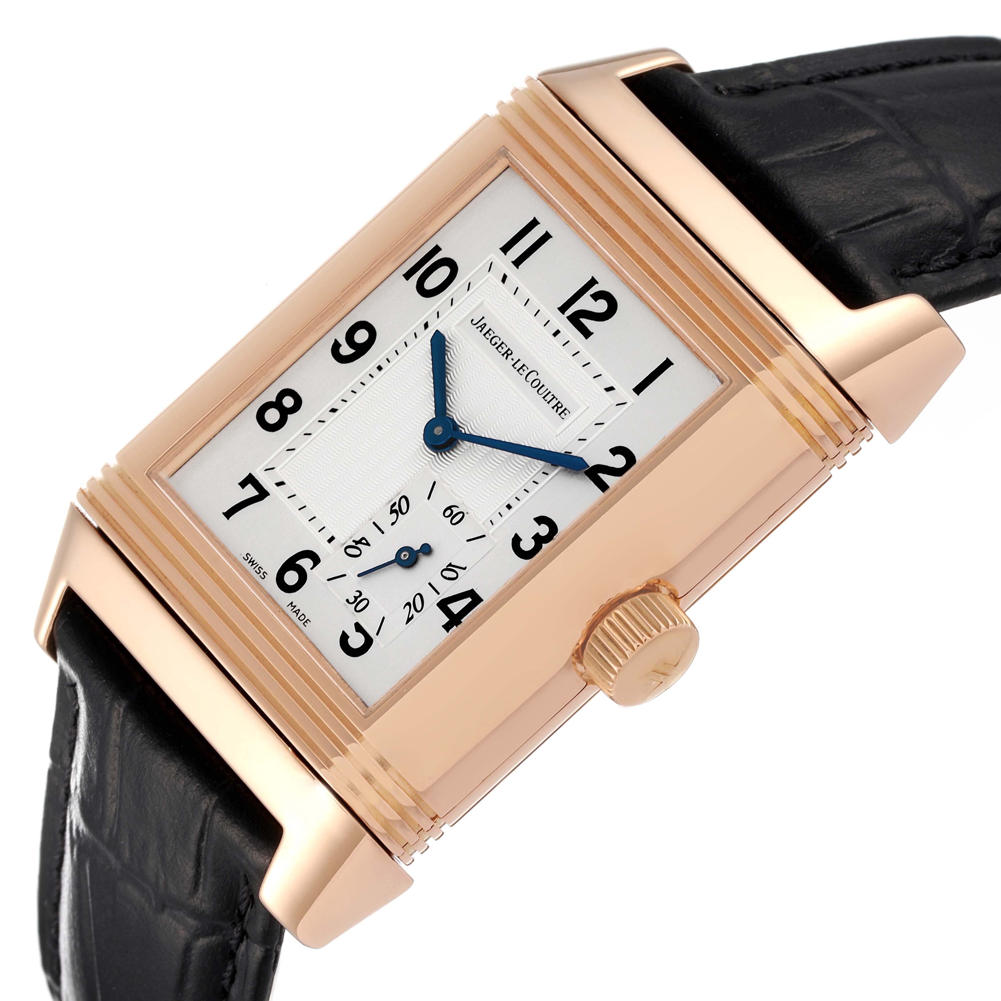 The Jaeger LeCoultre Reverso Q3012420 Men
s Rose Gold Silver Dial Q3012420 Men
s Rose Gold Silver Dial watch is shown at a three-quarter angle, highlighting its face, crown, and strap.