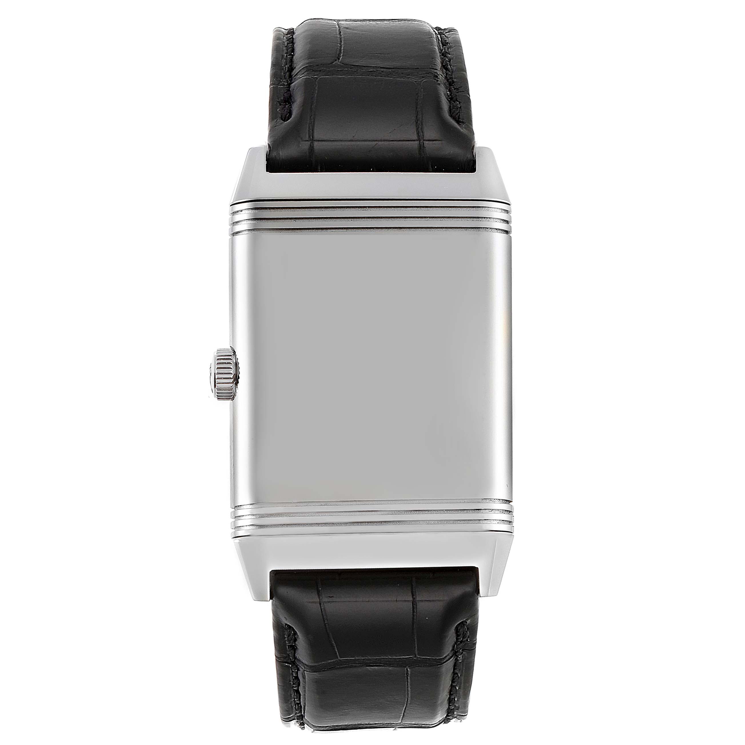 The image shows a front view of a Jaeger-LeCoultre Reverso watch, displaying its rectangular case and black leather strap.