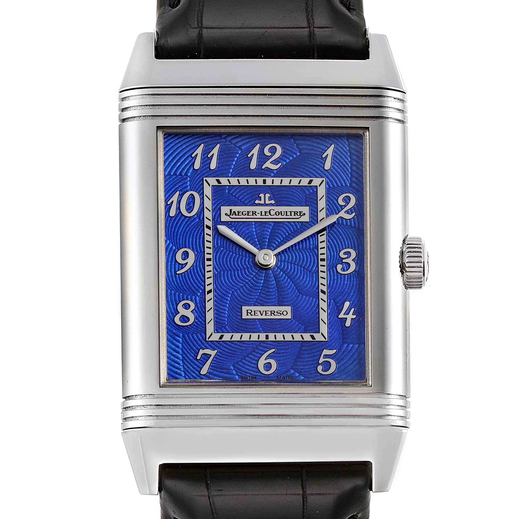 The watch is a Jaeger LeCoultre Reverso Q33735E1 Men's White Gold Blue Dial Q33735E1 Men's White Gold Blue Dial model shown from a front angle, displaying its rectangular blue dial and black leather strap.