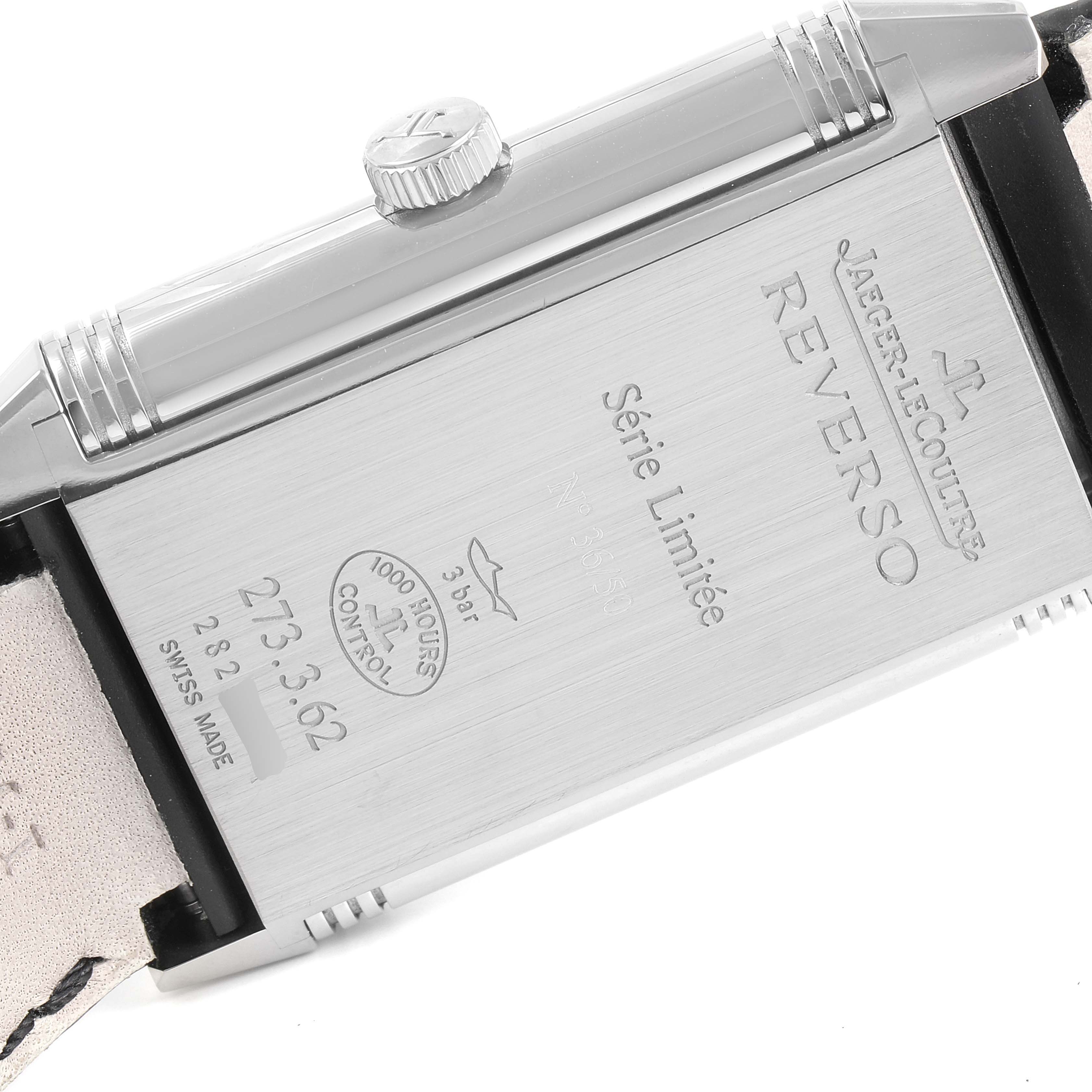The image shows the back of the Jaeger-LeCoultre Reverso watch, displaying engravings and the crown at the side.