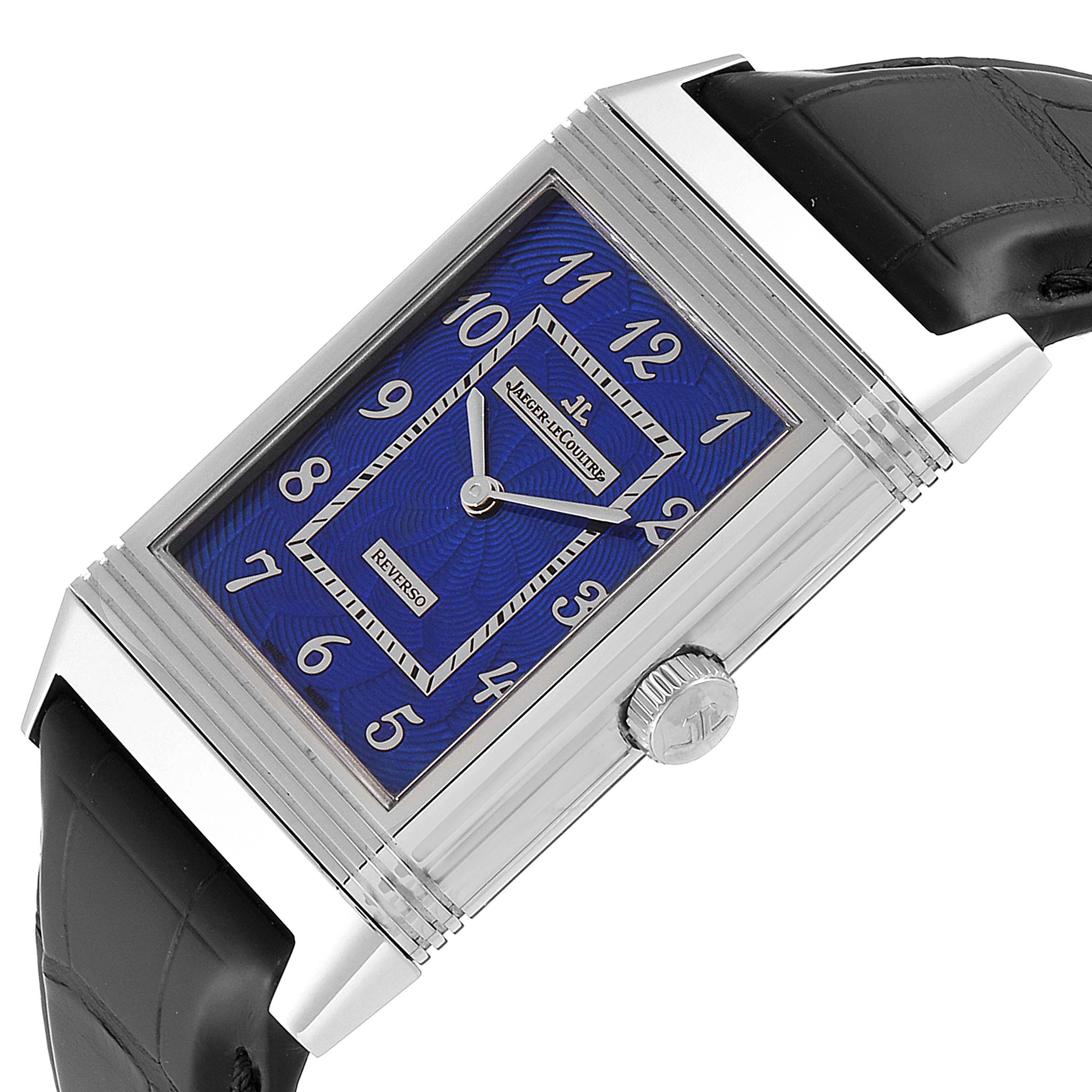 The Jaeger LeCoultre Reverso Q33735E1 Men's White Gold Blue Dial Q33735E1 Men's White Gold Blue Dial watch is shown at an angled view, highlighting the blue dial, crown, and parts of the black leather strap.