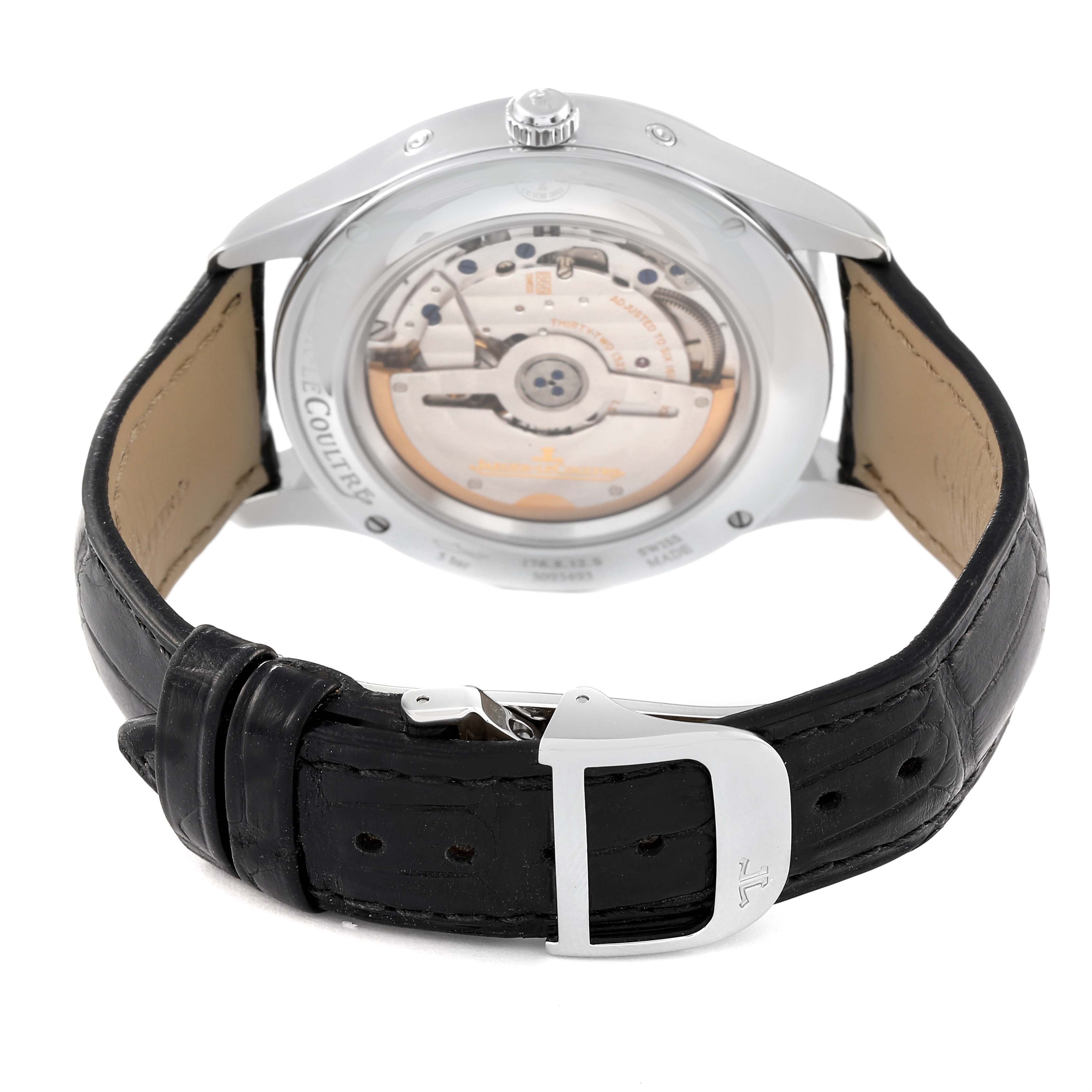 The image shows the back view of a Jaeger LeCoultre Master Q1558421 Men
s Stainless Steel Silver Dial Q1558421 Men
s Stainless Steel Silver Dial watch, highlighting its transparent case back and leather strap.