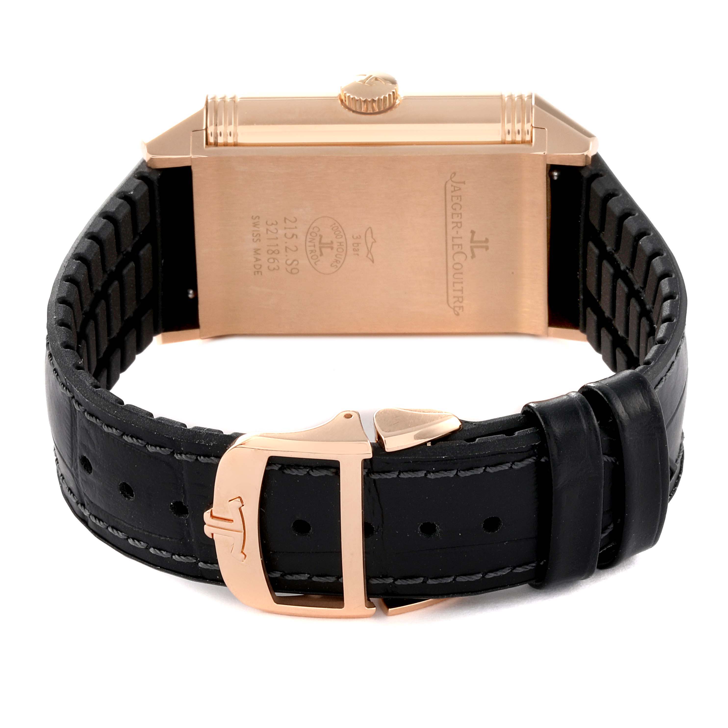 The image shows the back view of a Jaeger LeCoultre Reverso Q3832420 Men's Rose Gold Silver Dial Q3832420 Men's Rose Gold Silver Dial watch, highlighting its caseback, leather strap, and clasp.