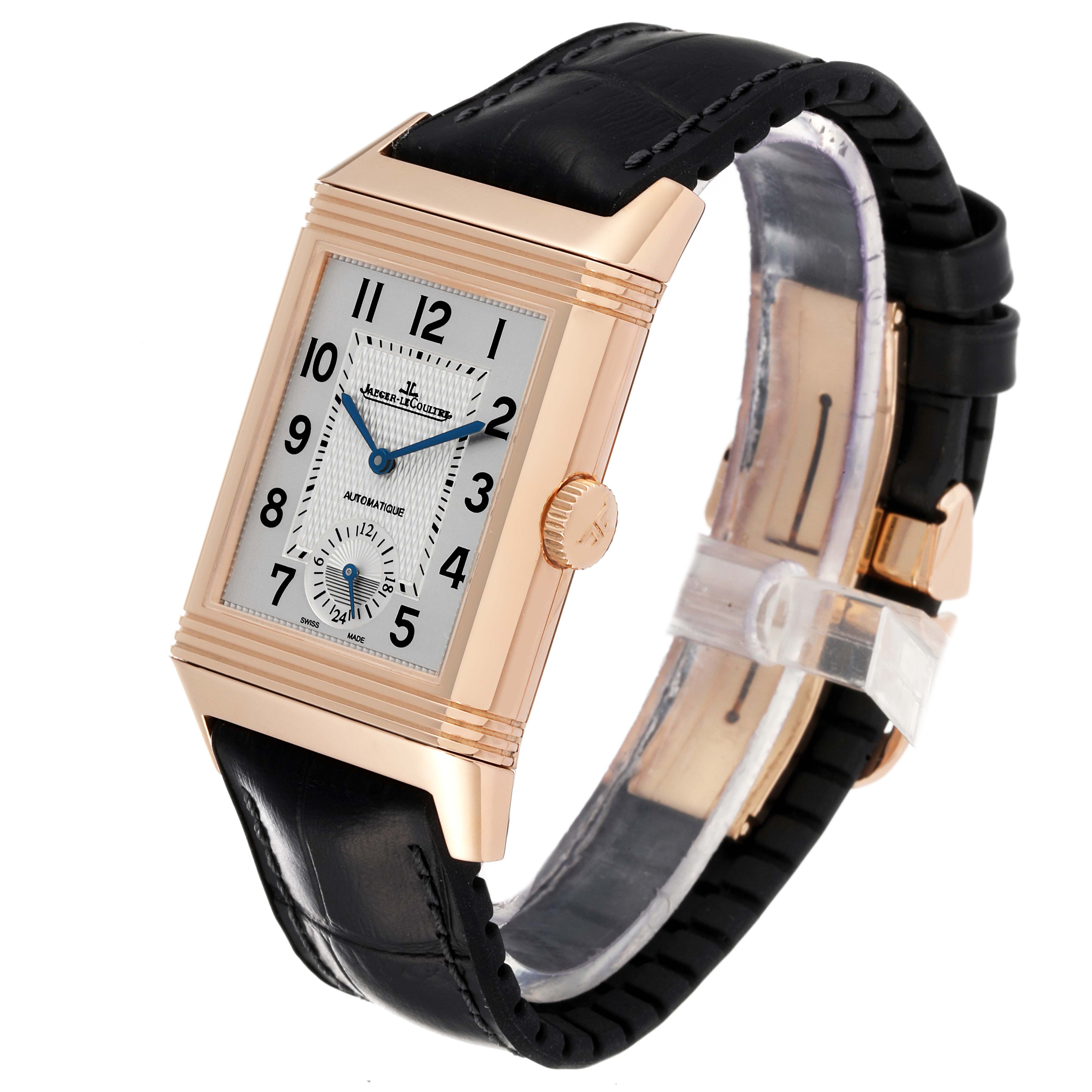 The image shows a Jaeger-LeCoultre Reverso watch from an angled side view, highlighting the rectangular face, crown, and black leather strap.