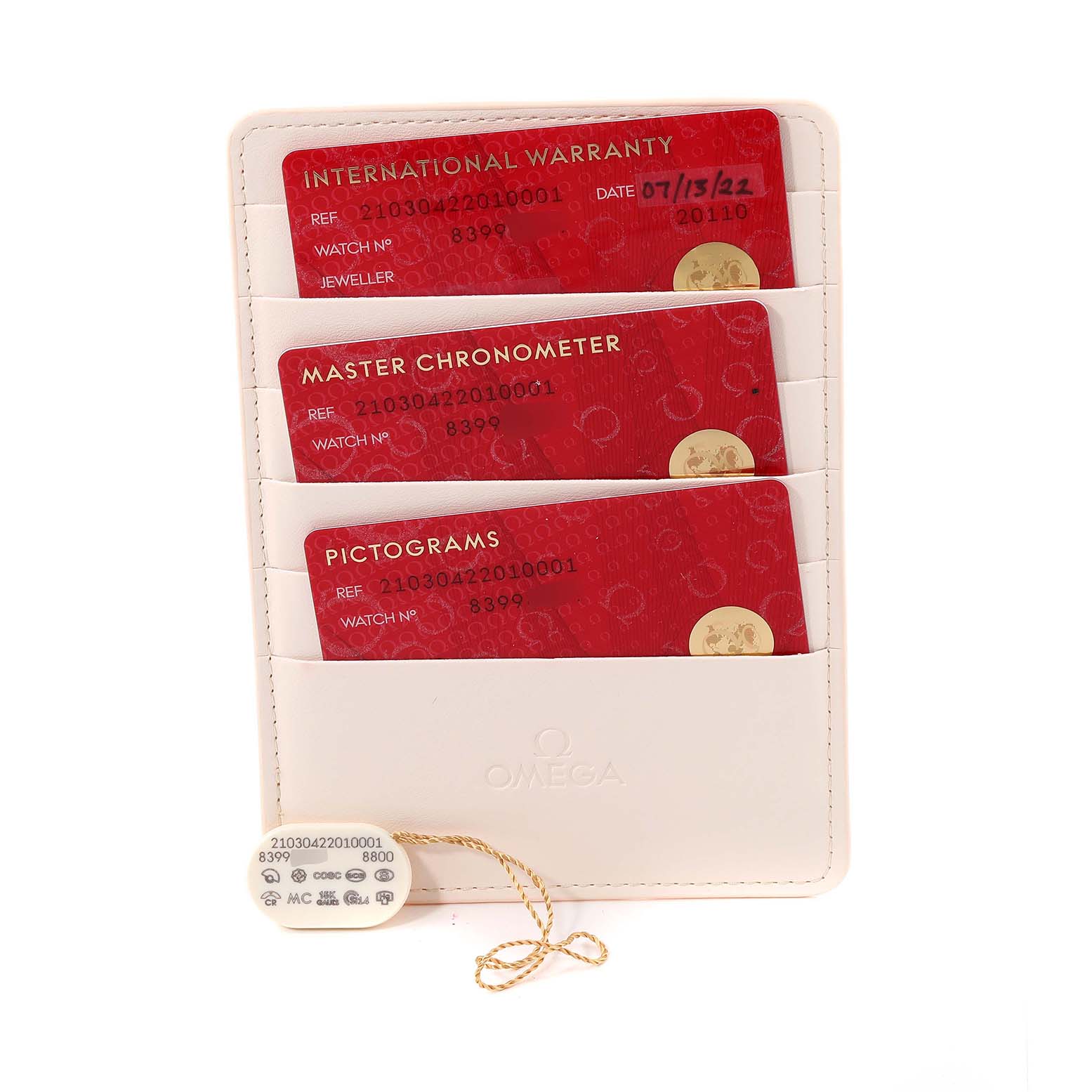 The image shows an Omega Seamaster 210.30.42.20.10.001 Men's Stainless Steel Green Dial 210.30.42.20.10.001 Men's Stainless Steel Green Dial's warranty card, master chronometer card, pictograms card, and hangtag in a white cardholder.