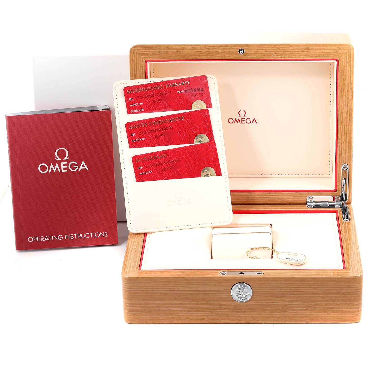 The image shows an Omega Seamaster 210.30.42.20.10.001 Men's Stainless Steel Green Dial 210.30.42.20.10.001 Men's Stainless Steel Green Dial watch box, warranty cards, and operating instructions, viewed from the front.