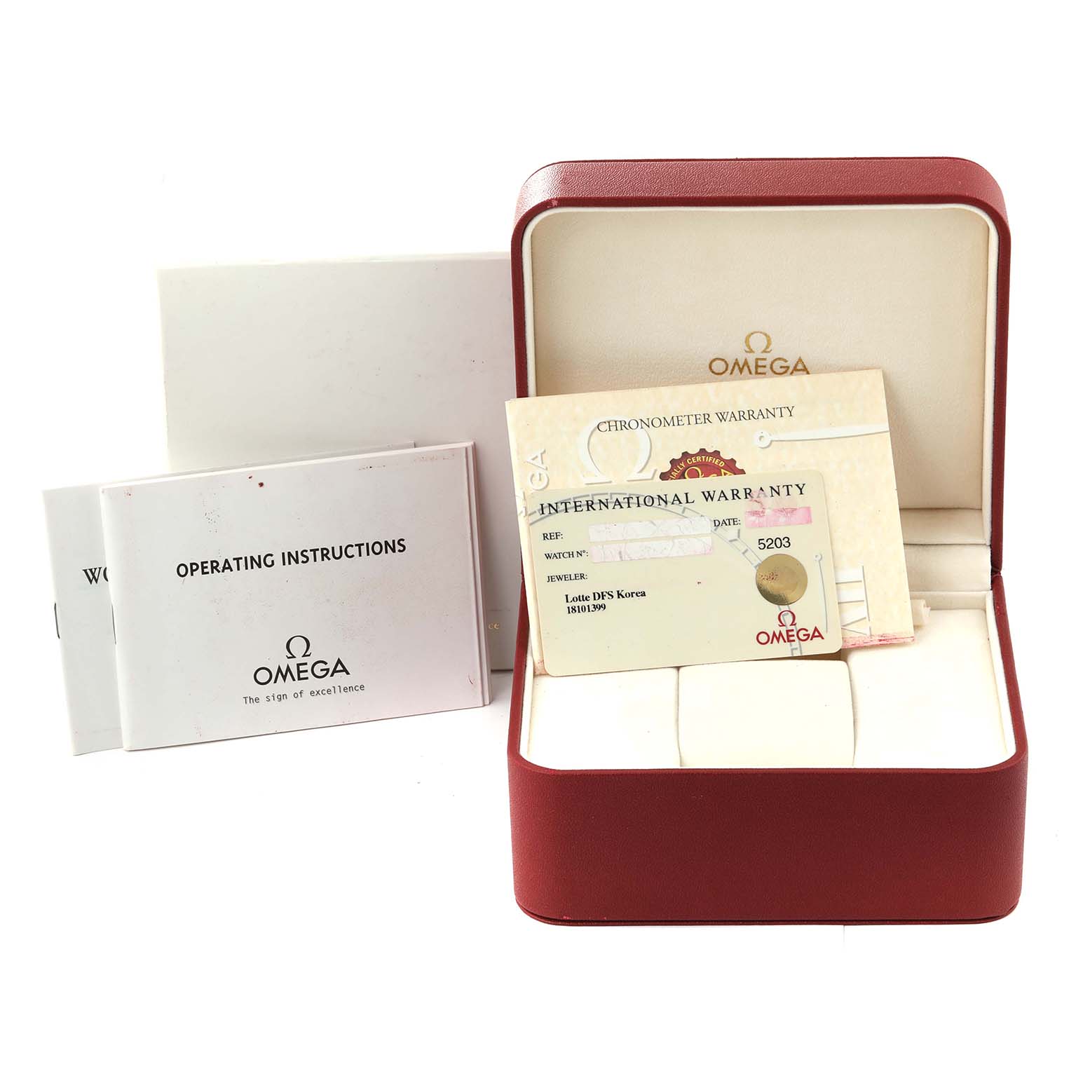 The image shows the open box, warranty cards, and instruction manuals for an Omega Seamaster 2534.50.00 Men
s Stainless Steel Black Dial 2534.50.00 Men
s Stainless Steel Black Dial watch.