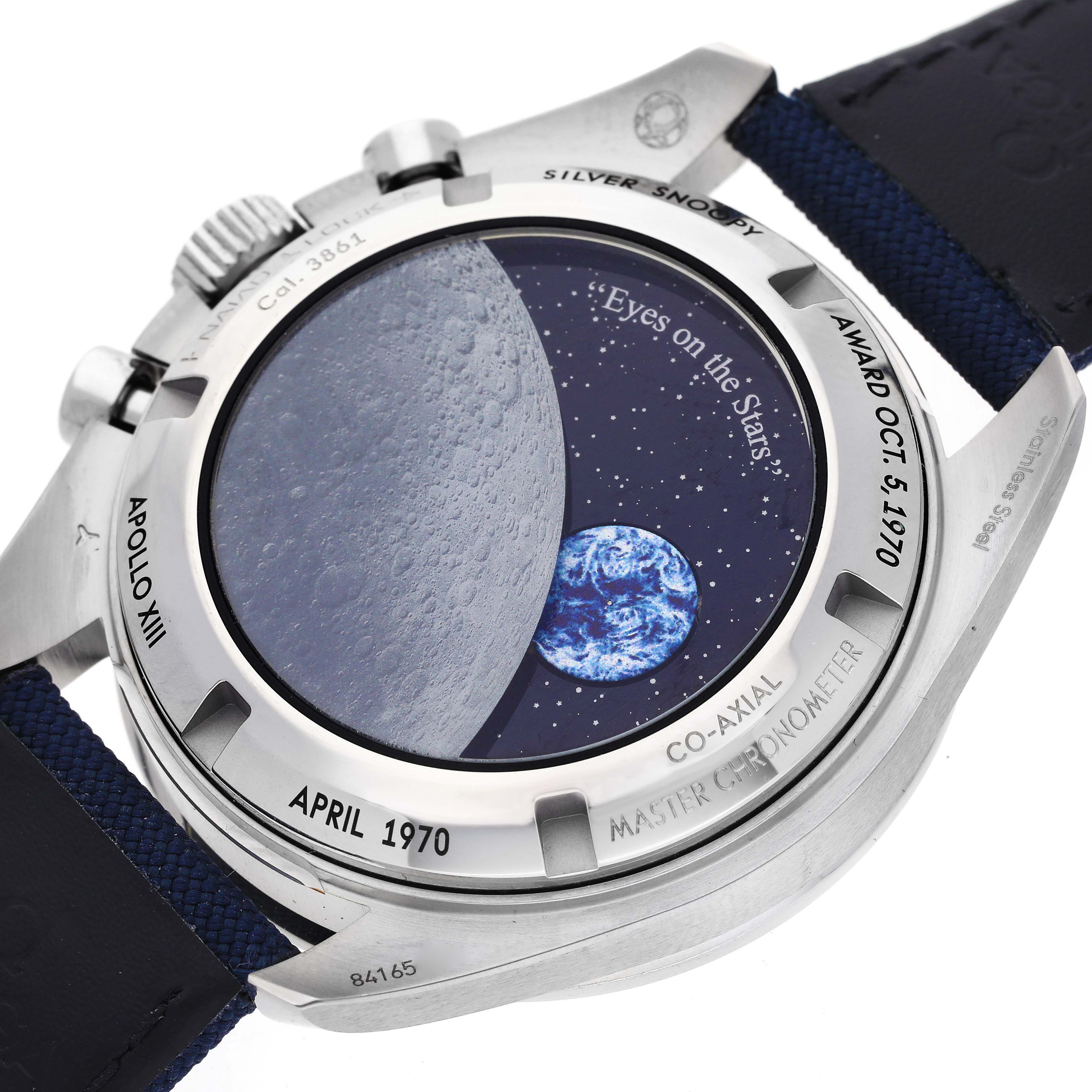 The image shows the back of an Omega Speedmaster 310.32.42.50.02.001 Men
s Stainless Steel Silver Dial 310.32.42.50.02.001 Men
s Stainless Steel Silver Dial watch, featuring an Apollo XIII themed design and a "Silver Snoopy Award" engraving.