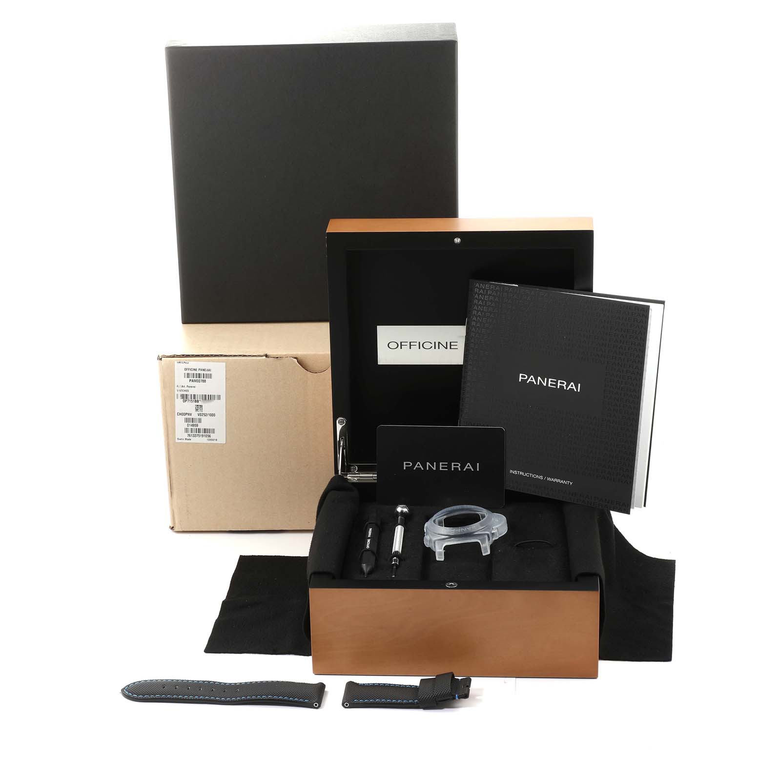 This image shows an unboxed Panerai Luminor PAM01275 Men's Ceramic Black Dial PAM01275 Men's Ceramic Black Dial watch set with accessories, manuals, and original packaging from a front angle.