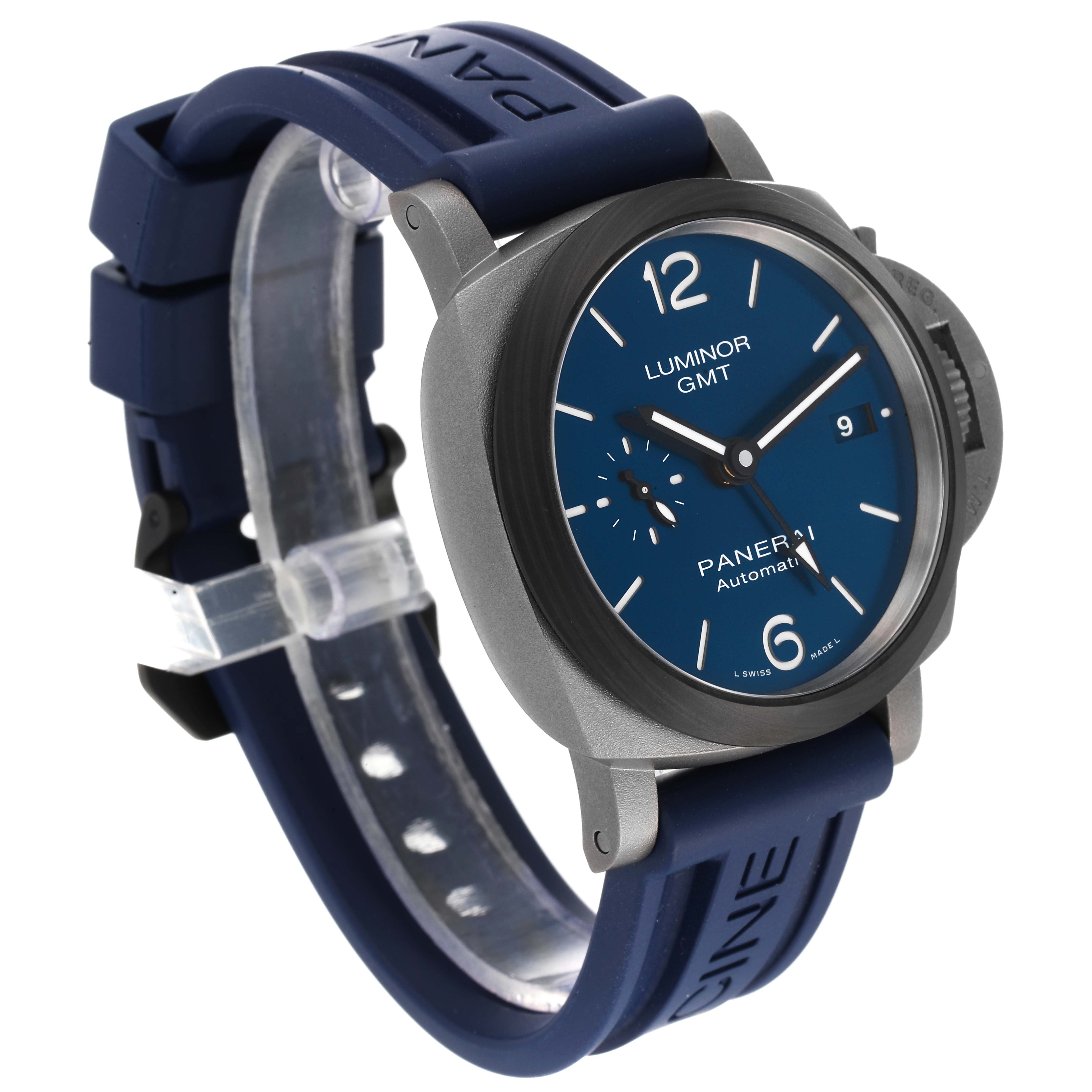 The Panerai Luminor PAM01279 Men's Titanium Blue Dial PAM01279 Men's Titanium Blue Dial GMT watch is shown at a three-quarter angle, highlighting the blue dial, case, and blue rubber strap.