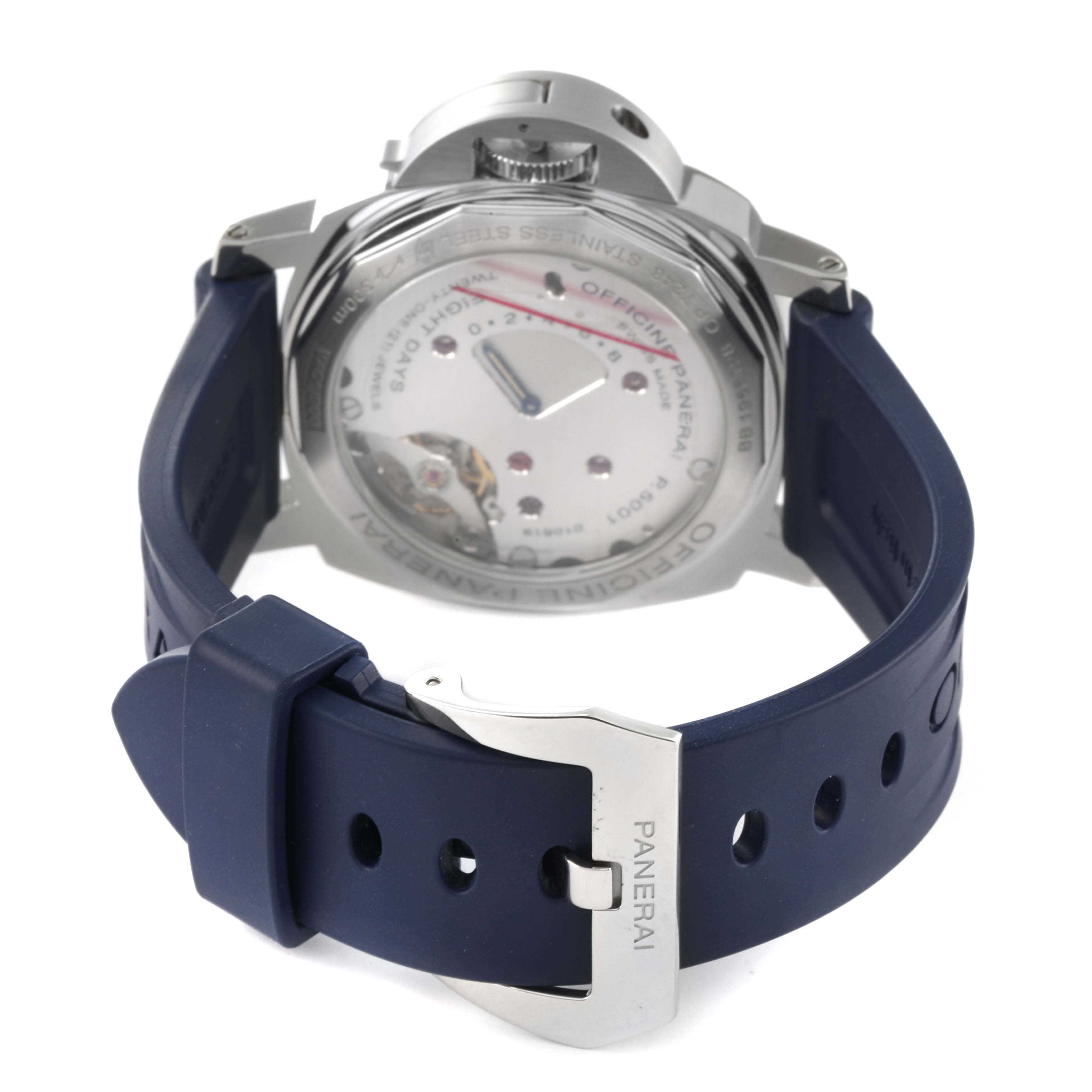 The image shows the back view of a Panerai Luminor PAM00796 Men
s Stainless Steel Black Dial PAM00796 Men
s Stainless Steel Black Dial watch, focusing on the movement and the blue strap with a buckle clasp.