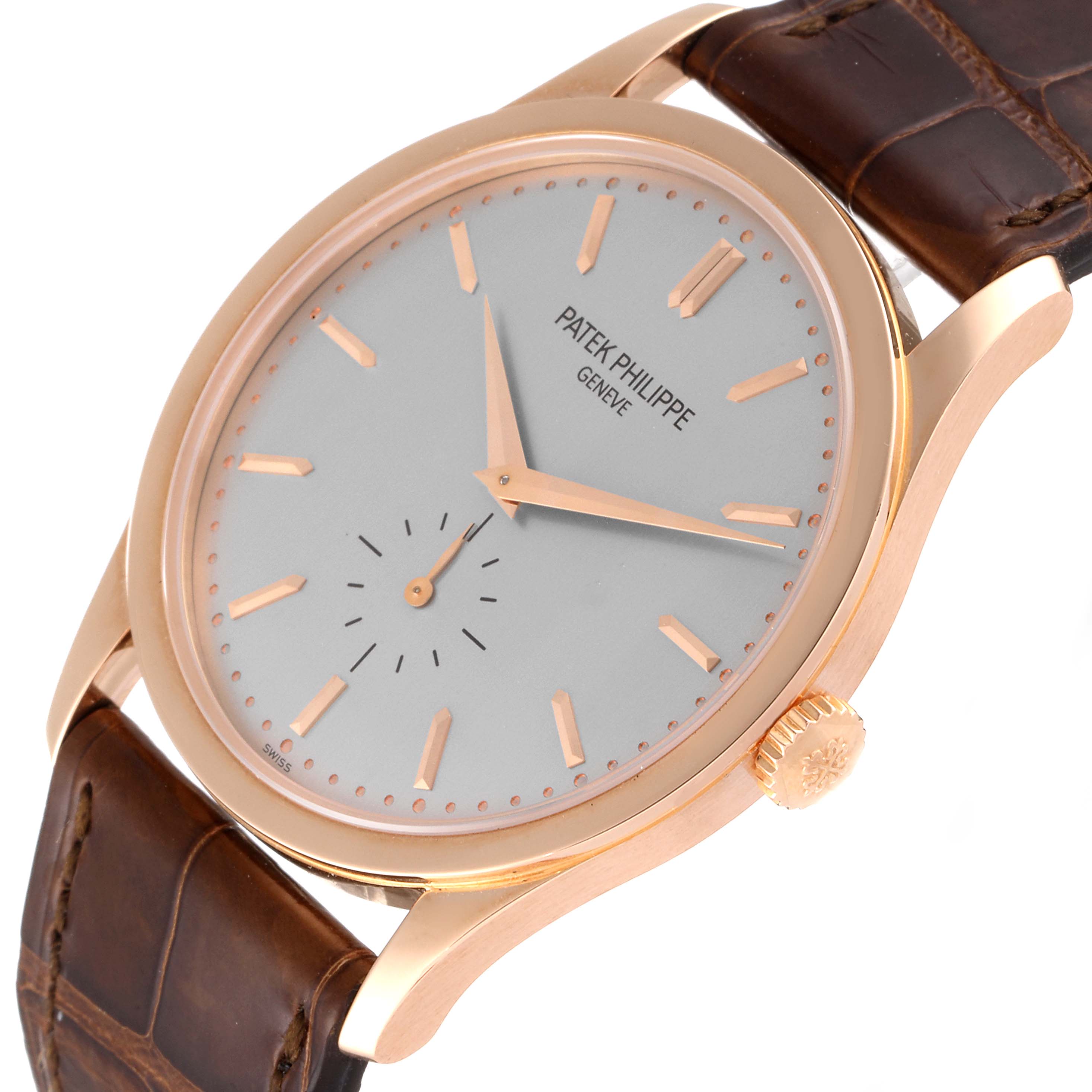 The image shows a close-up, angled view of the Patek Philippe Calatrava 5196R Men
s Rose Gold Silver Dial 5196R Men
s Rose Gold Silver Dial watch highlighting its face, hands, crown, and part of the strap.