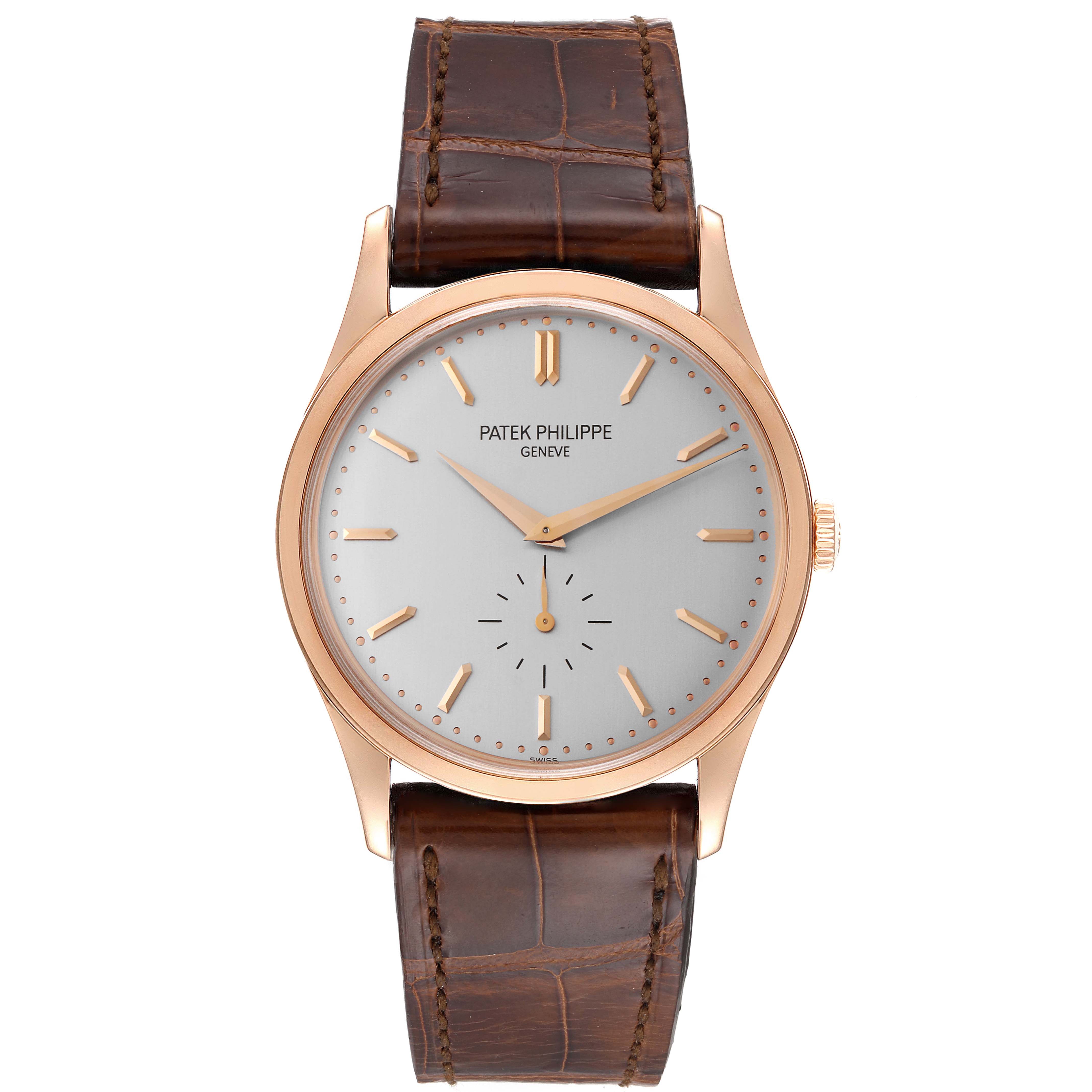 The image shows a front view of the Patek Philippe Calatrava 5196R Men
s Rose Gold Silver Dial 5196R Men
s Rose Gold Silver Dial watch with a brown leather strap and gold-tone case.